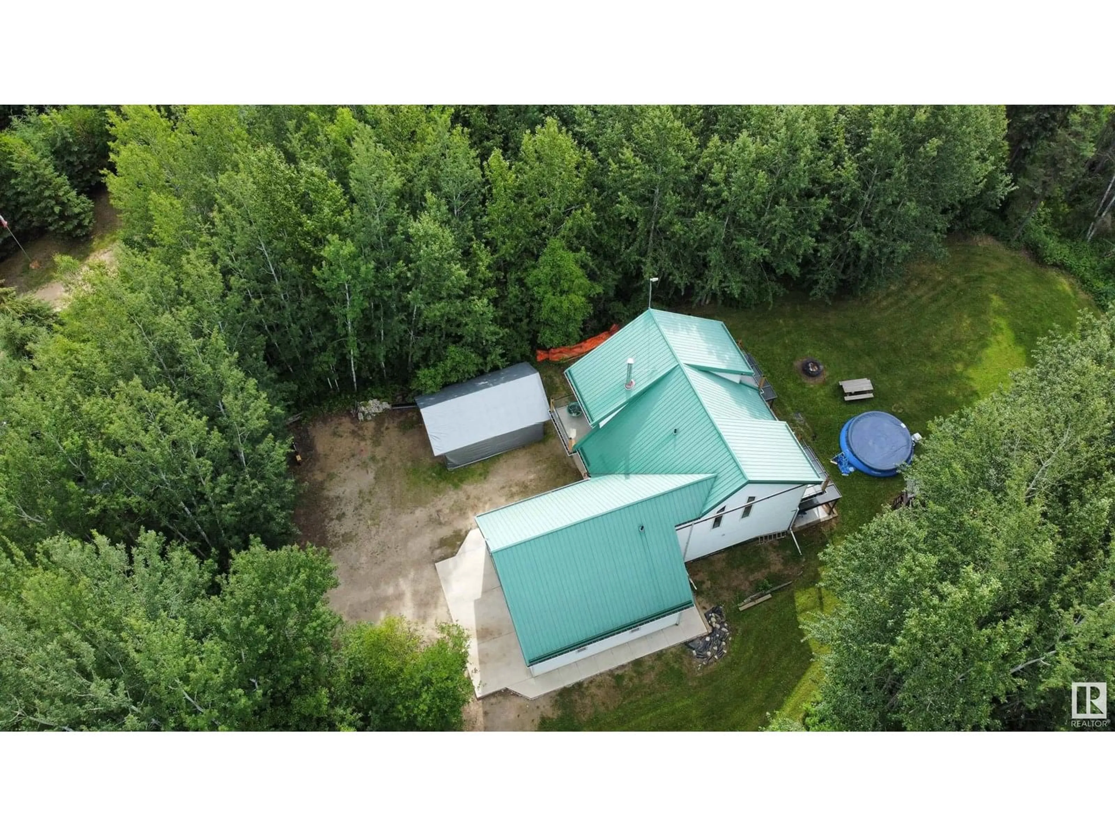 A pic from outside/outdoor area/front of a property/back of a property/a pic from drone, forest/trees view for 183049 - 66 HWY 663, Rural Athabasca County Alberta T0A0M0