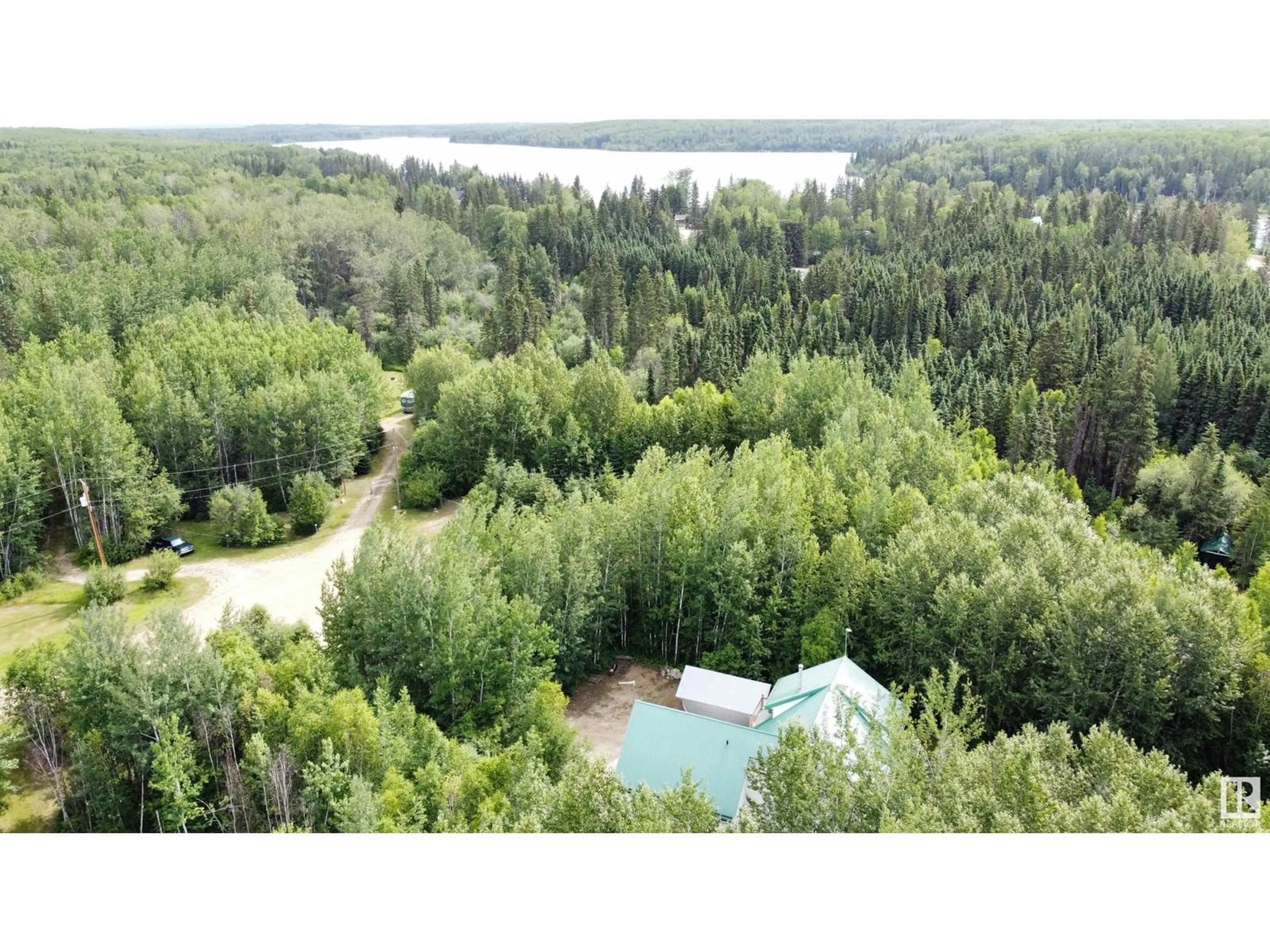 A pic from outside/outdoor area/front of a property/back of a property/a pic from drone, water/lake/river/ocean view for 183049 - 66 HWY 663, Rural Athabasca County Alberta T0A0M0
