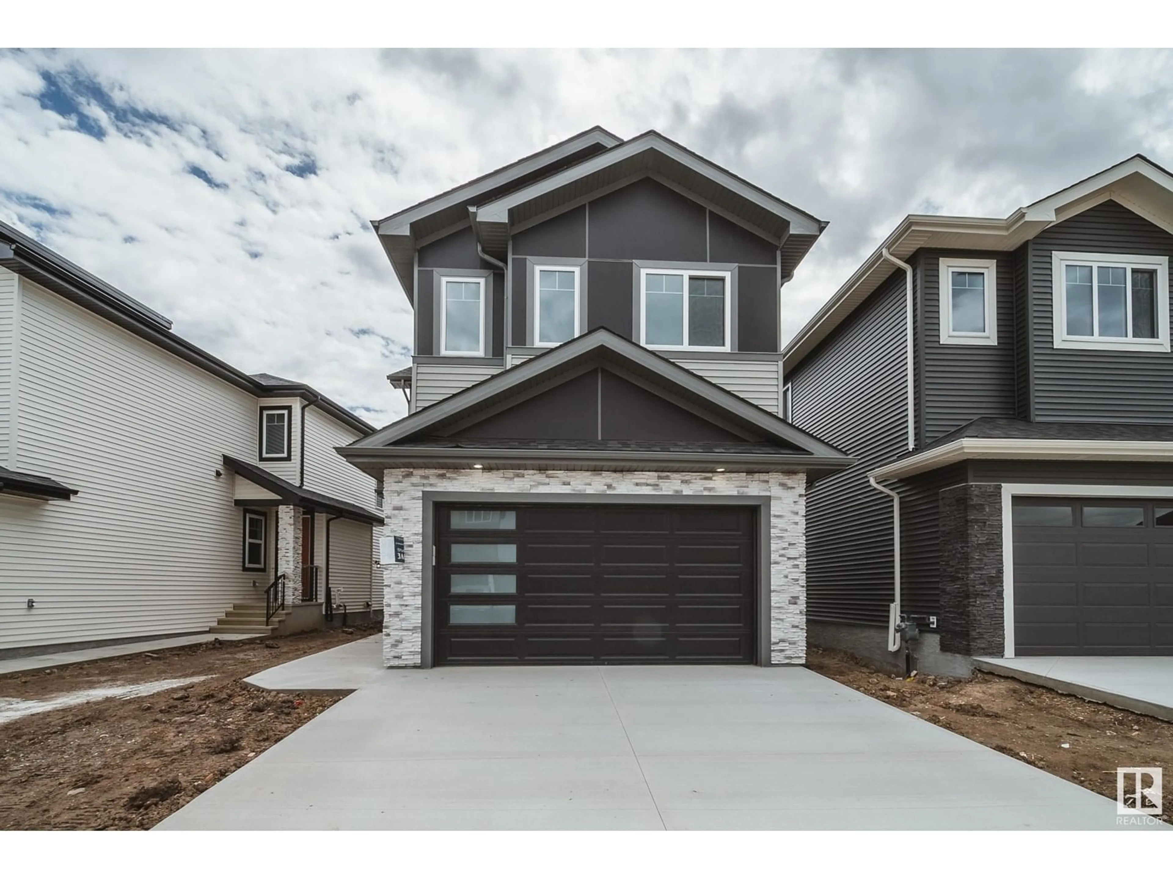 Home with brick exterior material, street for 8747 183 AV, Edmonton Alberta T5Z0S8