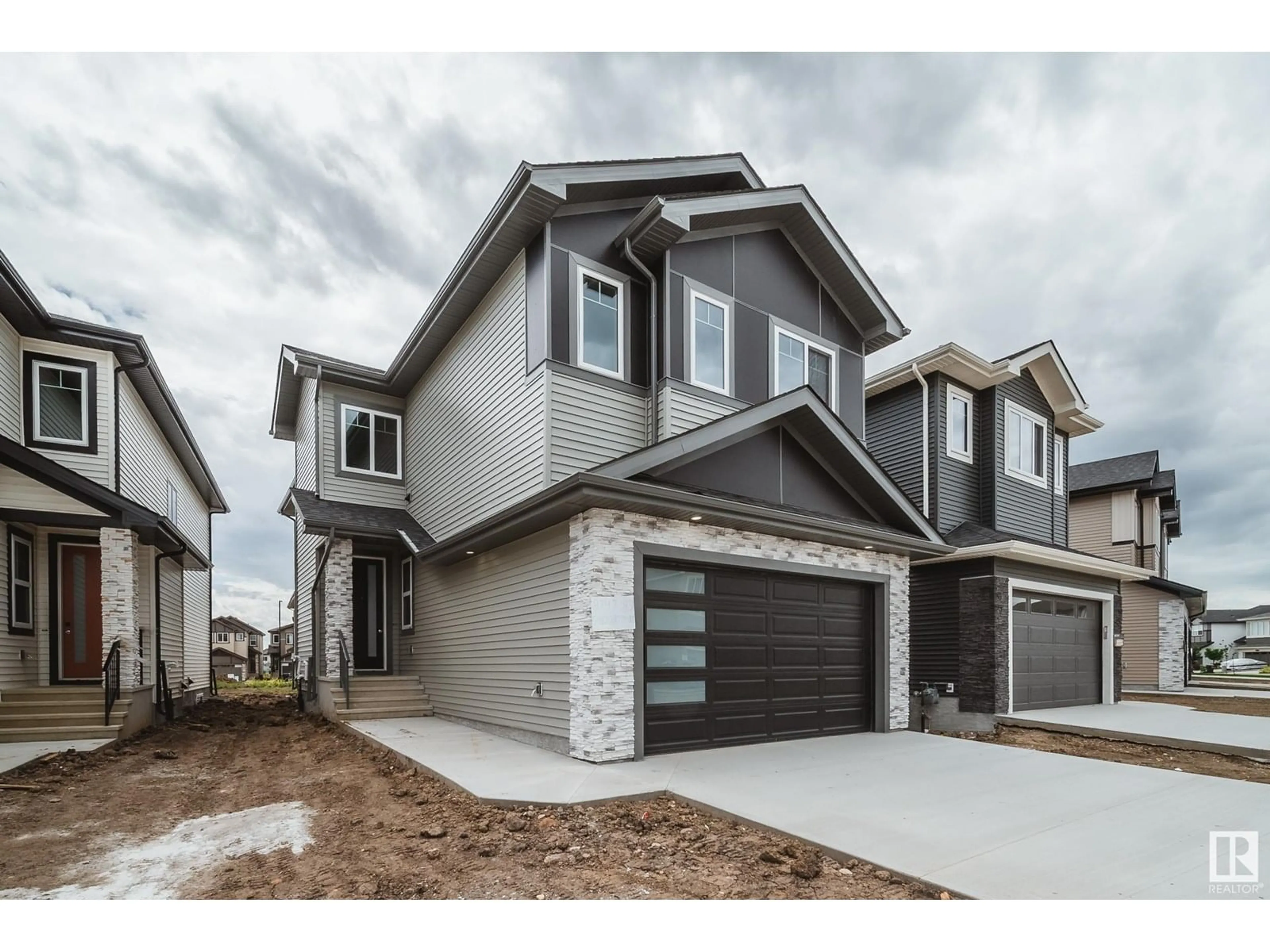 Home with brick exterior material, street for 8747 183 AV, Edmonton Alberta T5Z0S8