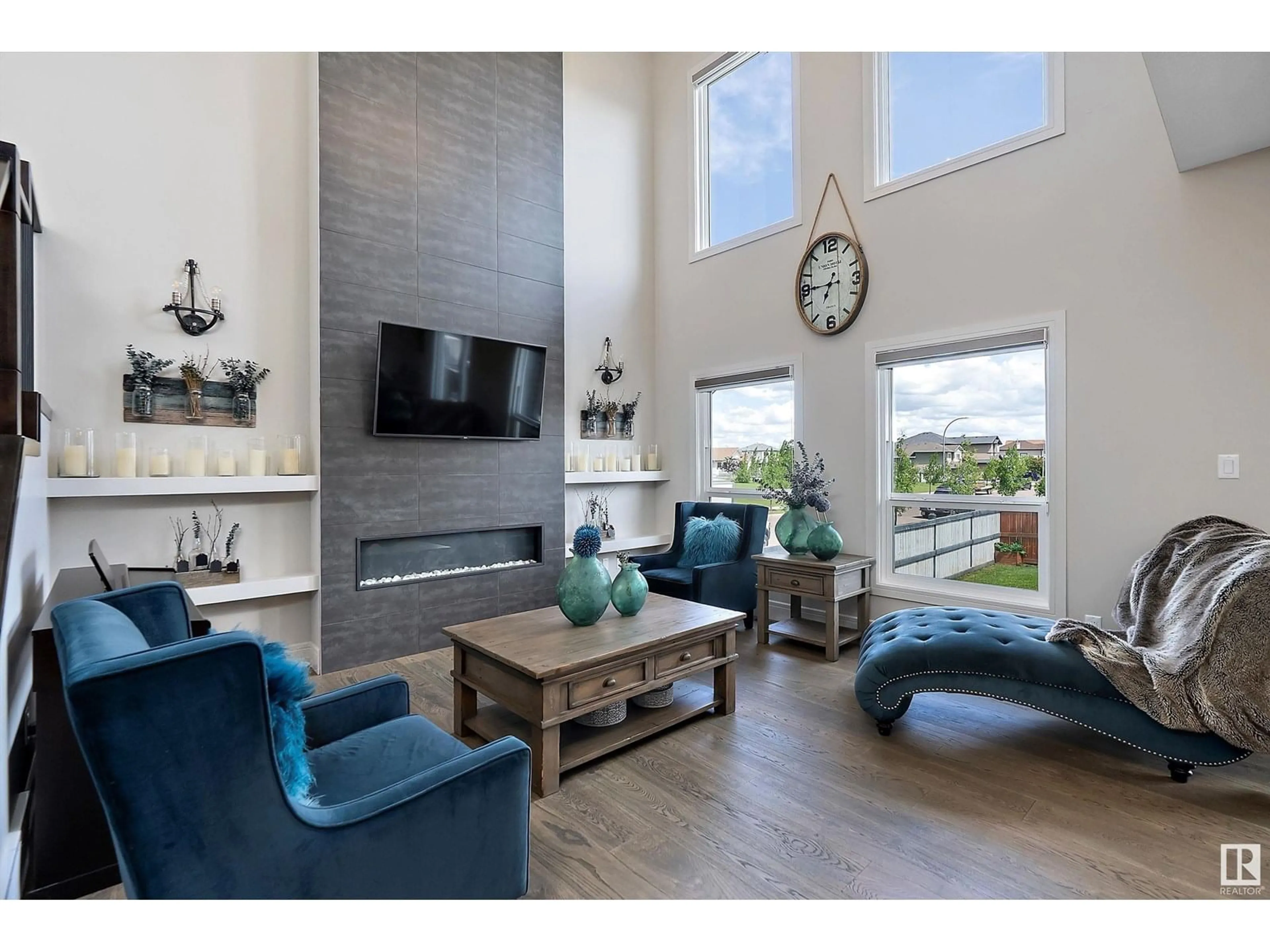 Living room with furniture, wood/laminate floor for 72 MCKENZIE, Leduc Alberta T9E1A4