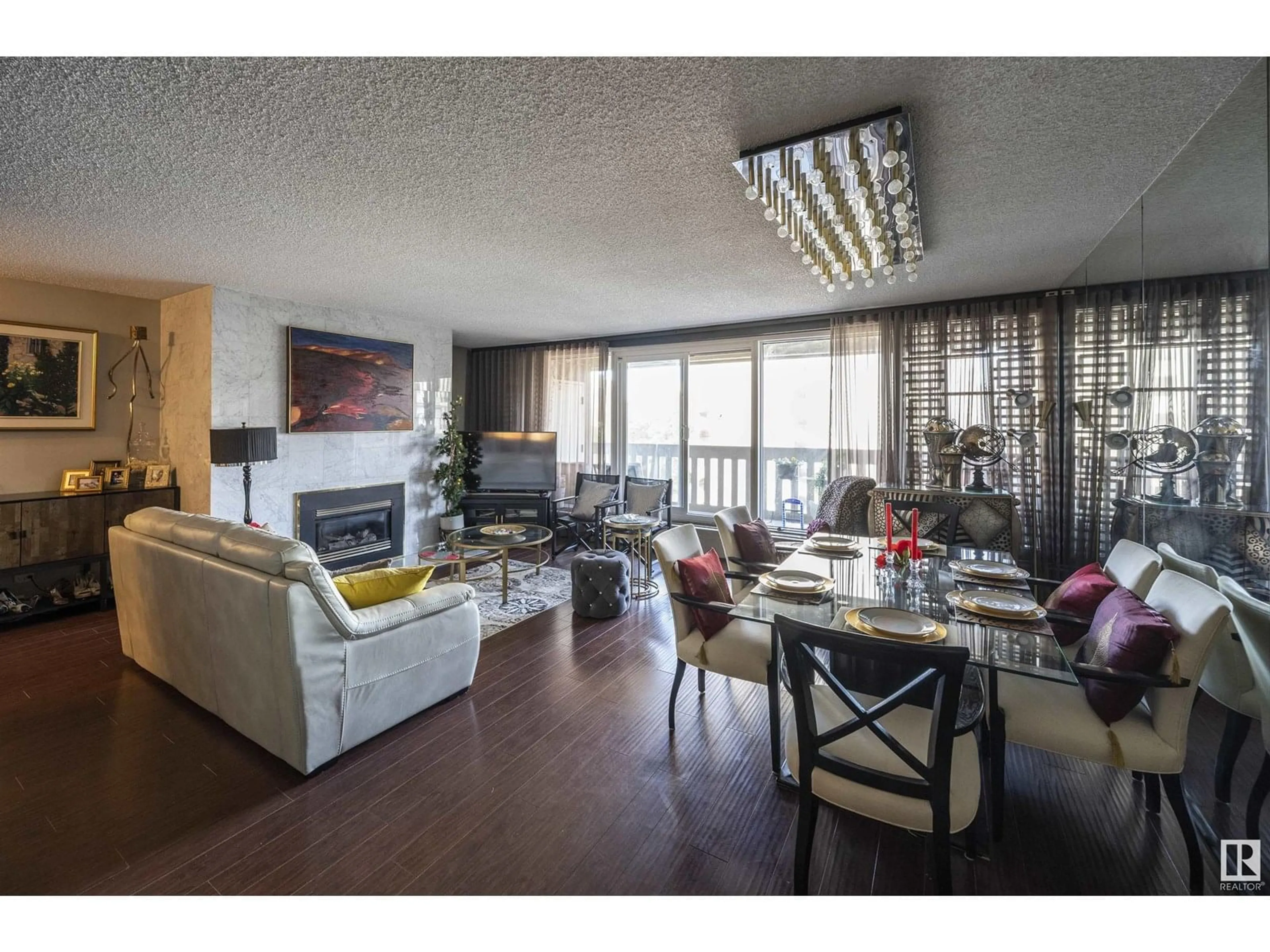 Living room with furniture, wood/laminate floor for #701 - 9809 110 ST, Edmonton Alberta T5K2J9