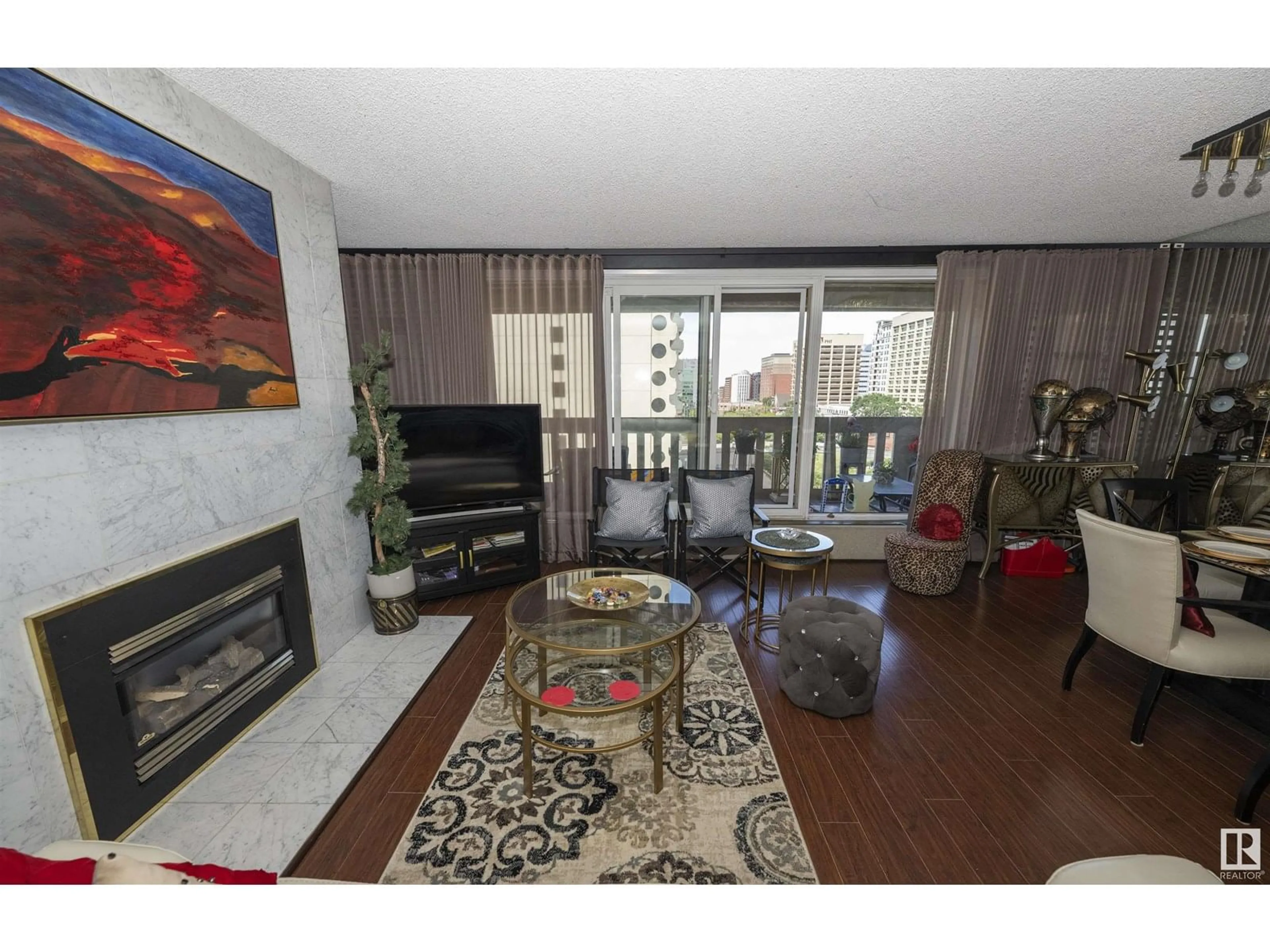 Living room with furniture, wood/laminate floor for #701 - 9809 110 ST, Edmonton Alberta T5K2J9