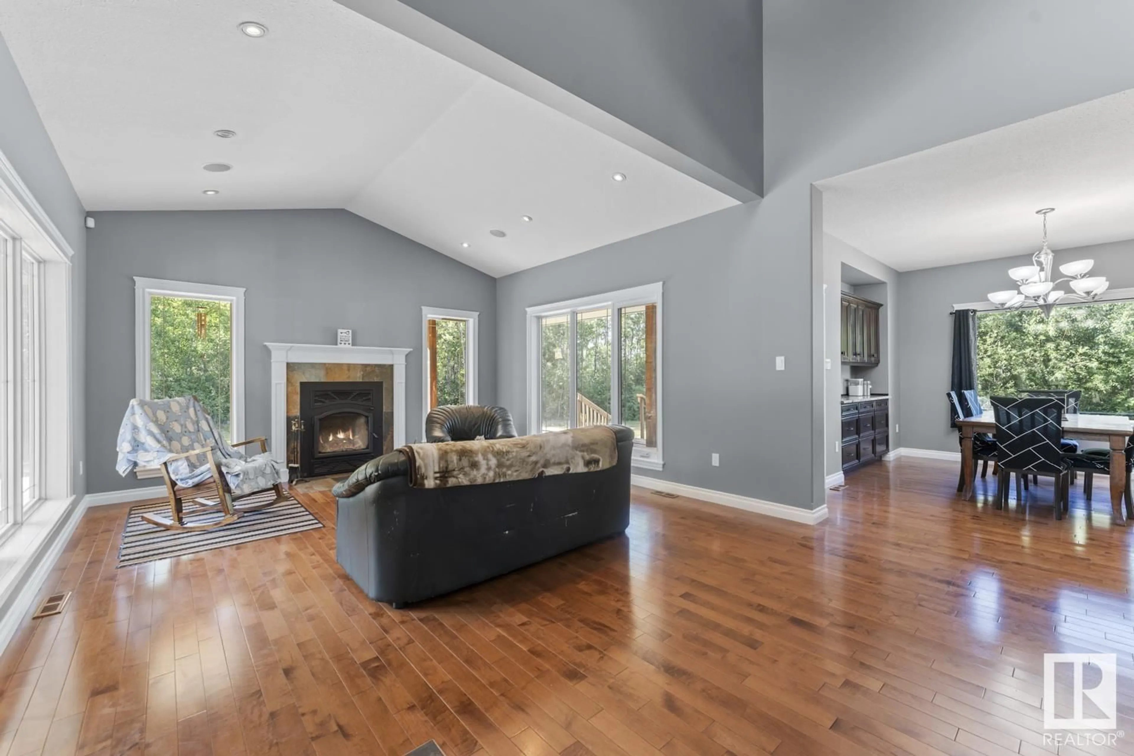 Living room with furniture, wood/laminate floor for 48 63220 RGE RD RD, Rural Bonnyville M.D. Alberta T9M1P2