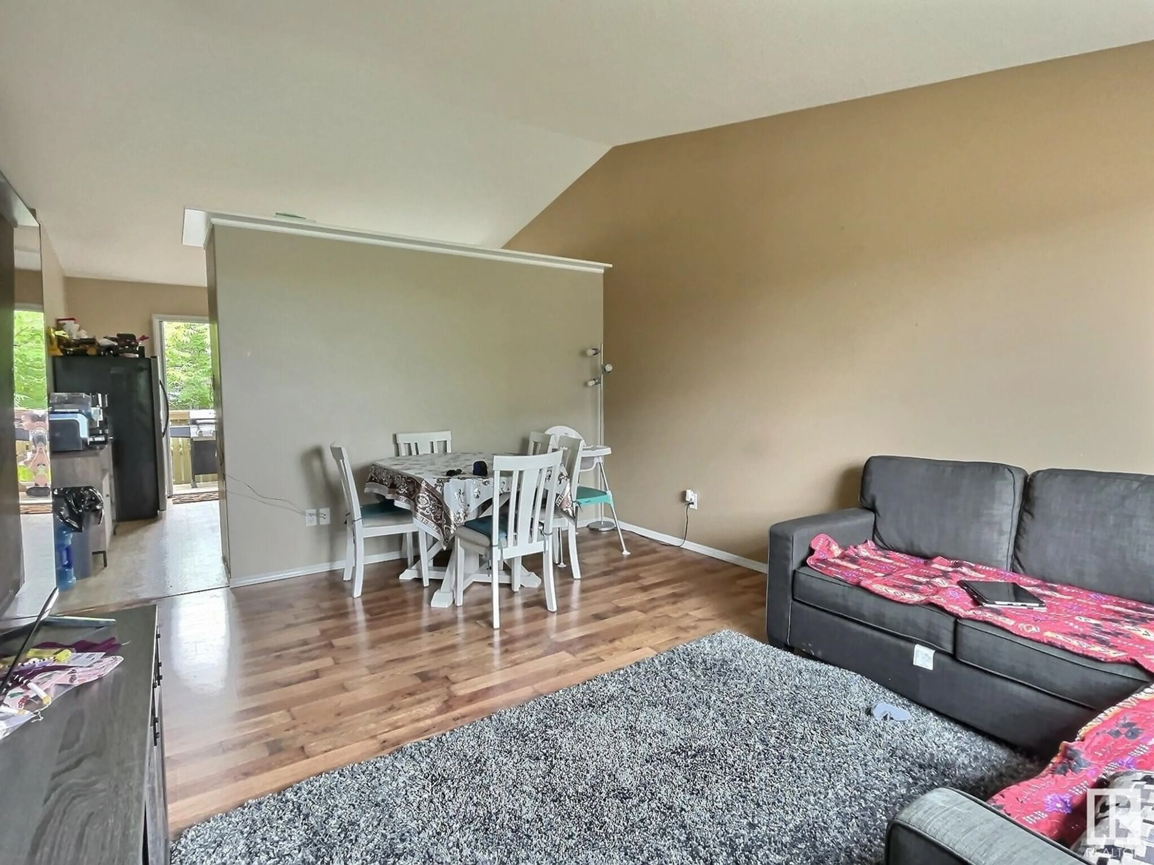 Living room with furniture, wood/laminate floor for 20 6506 47 ST, Cold Lake Alberta T9M0C5