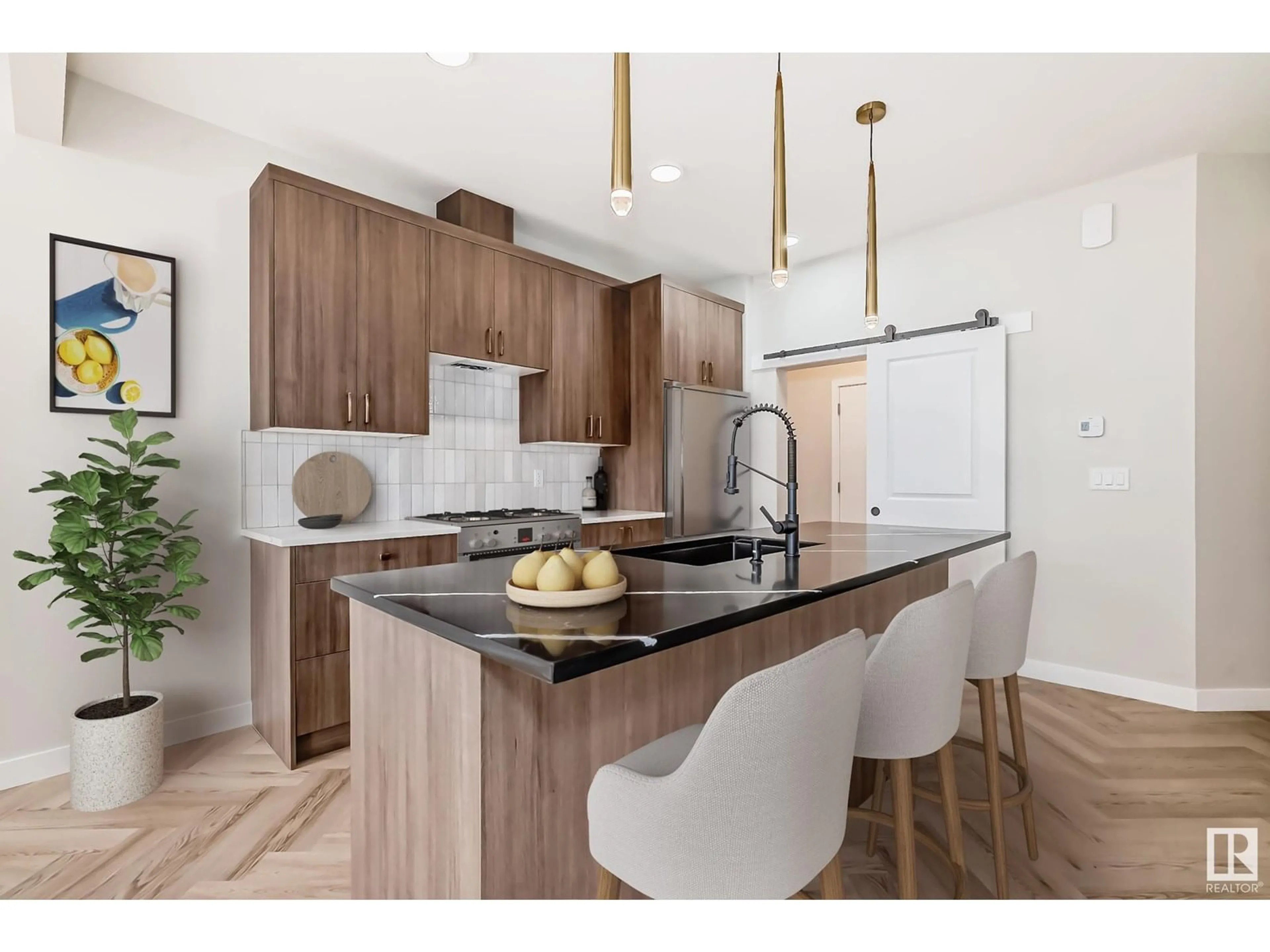 Open concept kitchen, wood/laminate floor for 2909 65 ST, Edmonton Alberta T6X3J7