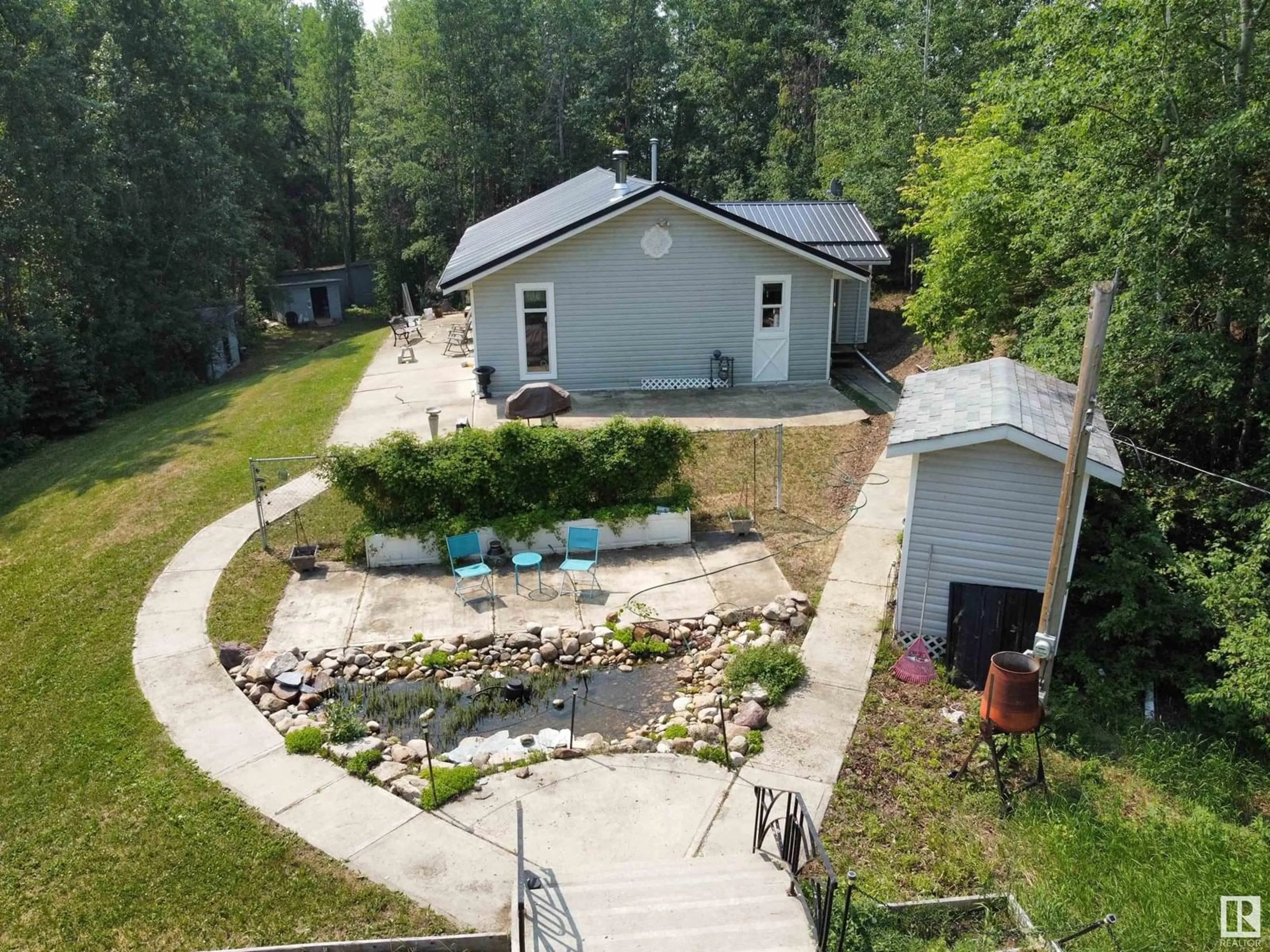 A pic from outside/outdoor area/front of a property/back of a property/a pic from drone, mountain view for 23 - 54126 RANGE ROAD 52, Rural Lac Ste. Anne County Alberta T0E0L0