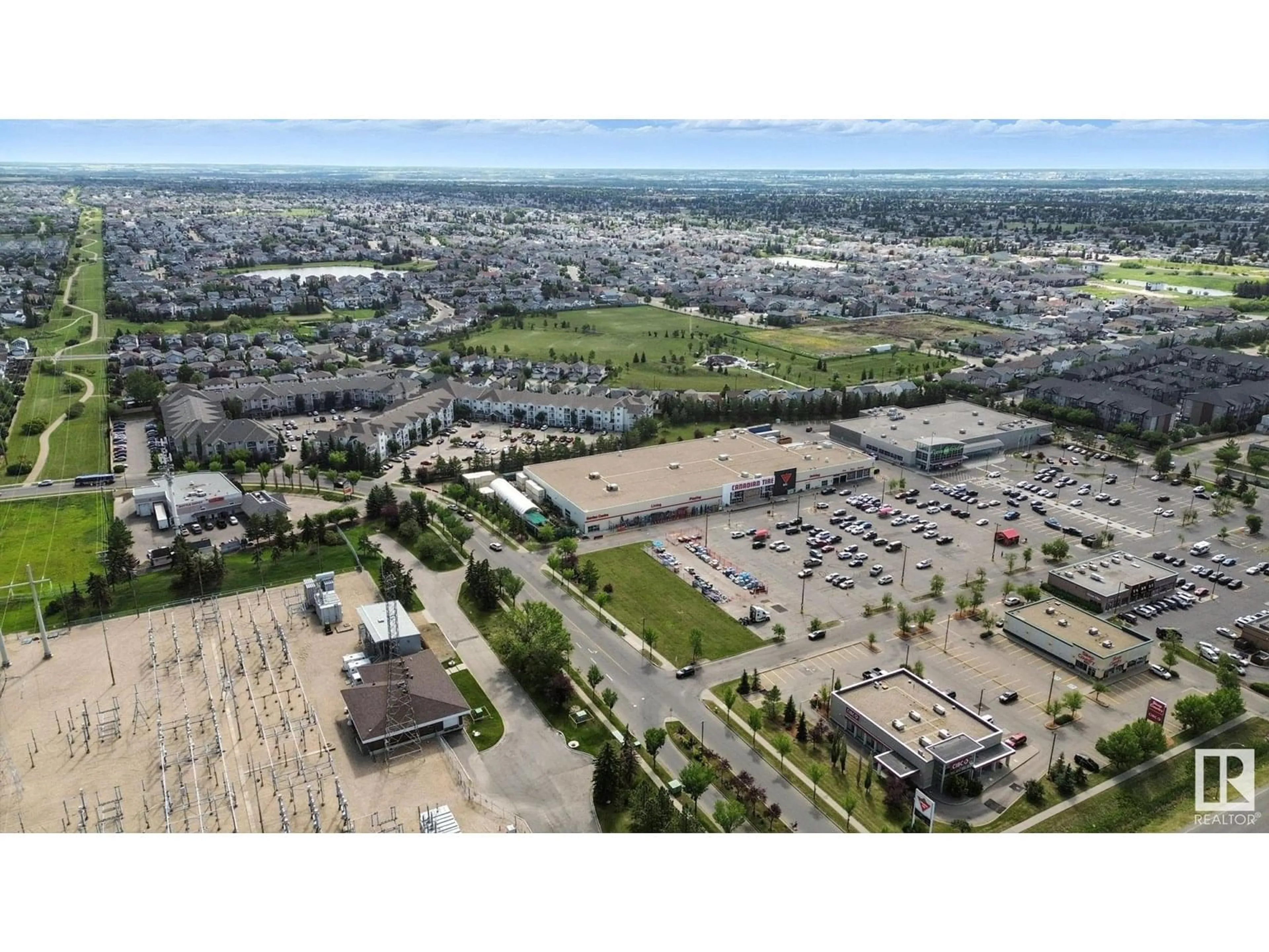 A pic from outside/outdoor area/front of a property/back of a property/a pic from drone, street for #327 - 9525 162 AV, Edmonton Alberta T5Z3V2