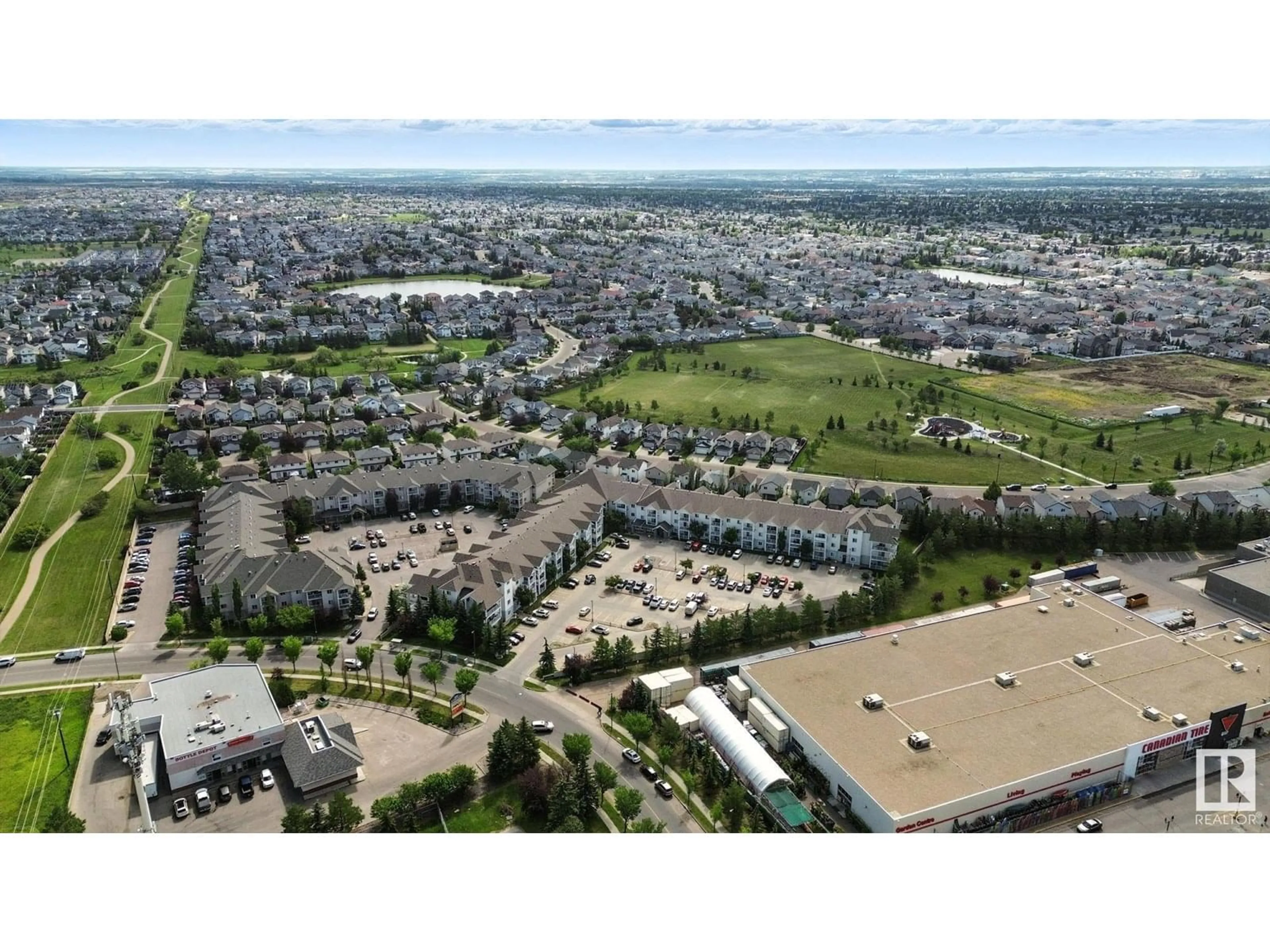 A pic from outside/outdoor area/front of a property/back of a property/a pic from drone, mountain view for #327 - 9525 162 AV, Edmonton Alberta T5Z3V2