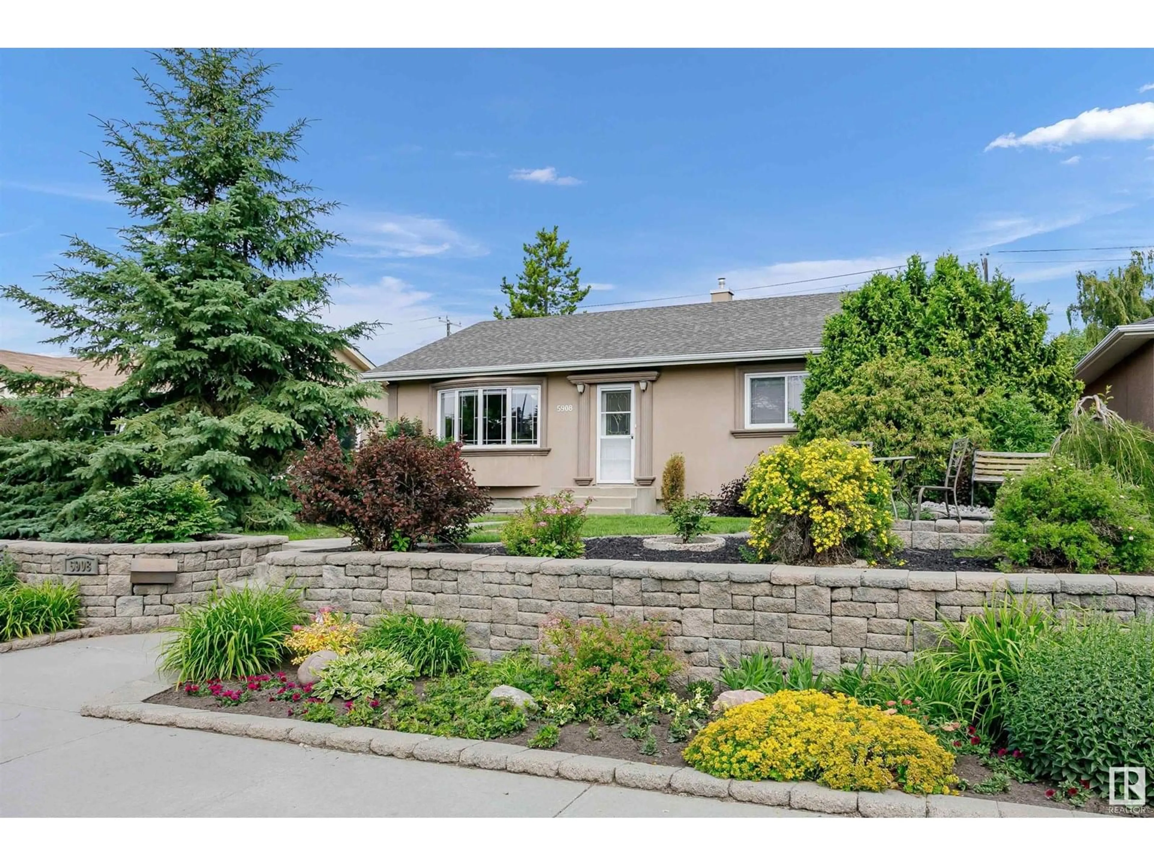 Home with vinyl exterior material, street for 5908 106 AV, Edmonton Alberta T6A1G5