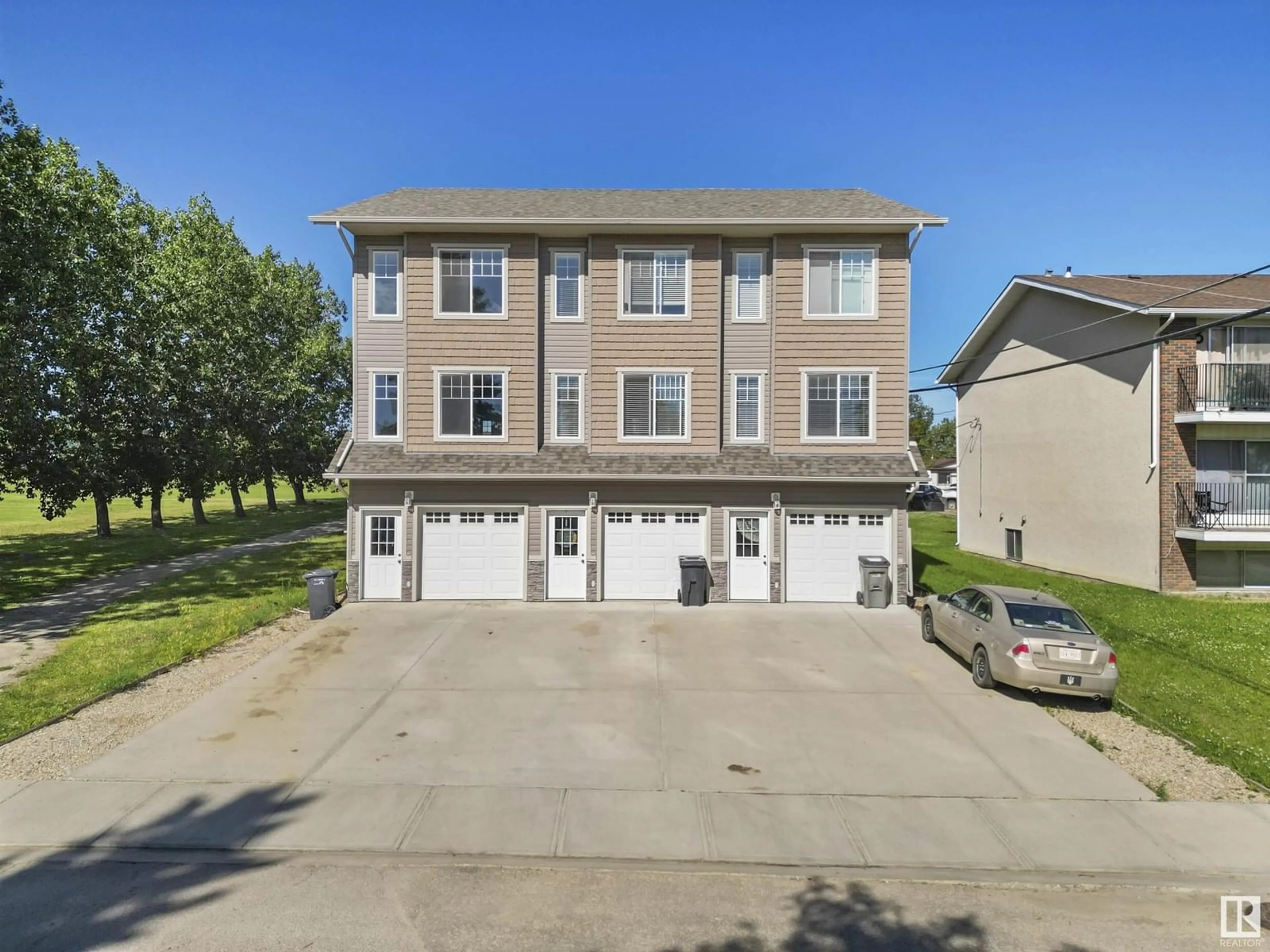 A pic from outside/outdoor area/front of a property/back of a property/a pic from drone, street for #2 - 4904 44 STREET, Drayton Valley Alberta T7A1B2