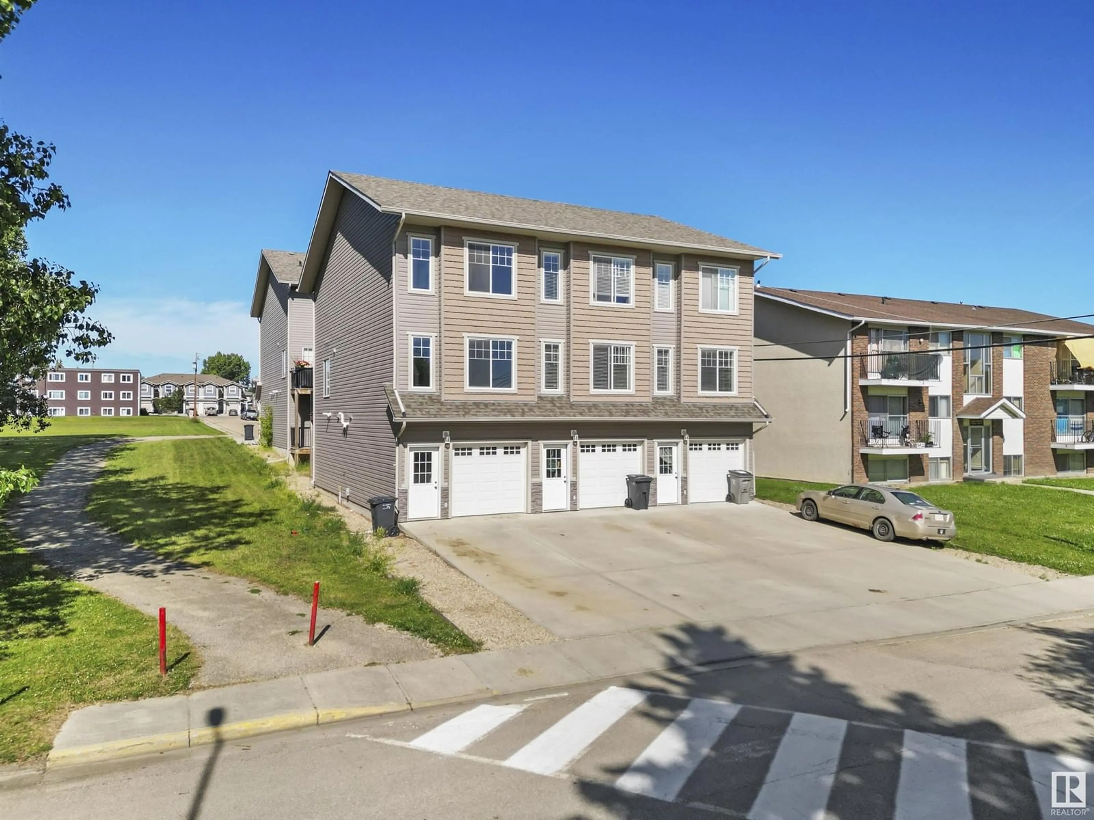 A pic from outside/outdoor area/front of a property/back of a property/a pic from drone, street for #2 - 4904 44 STREET, Drayton Valley Alberta T7A1B2