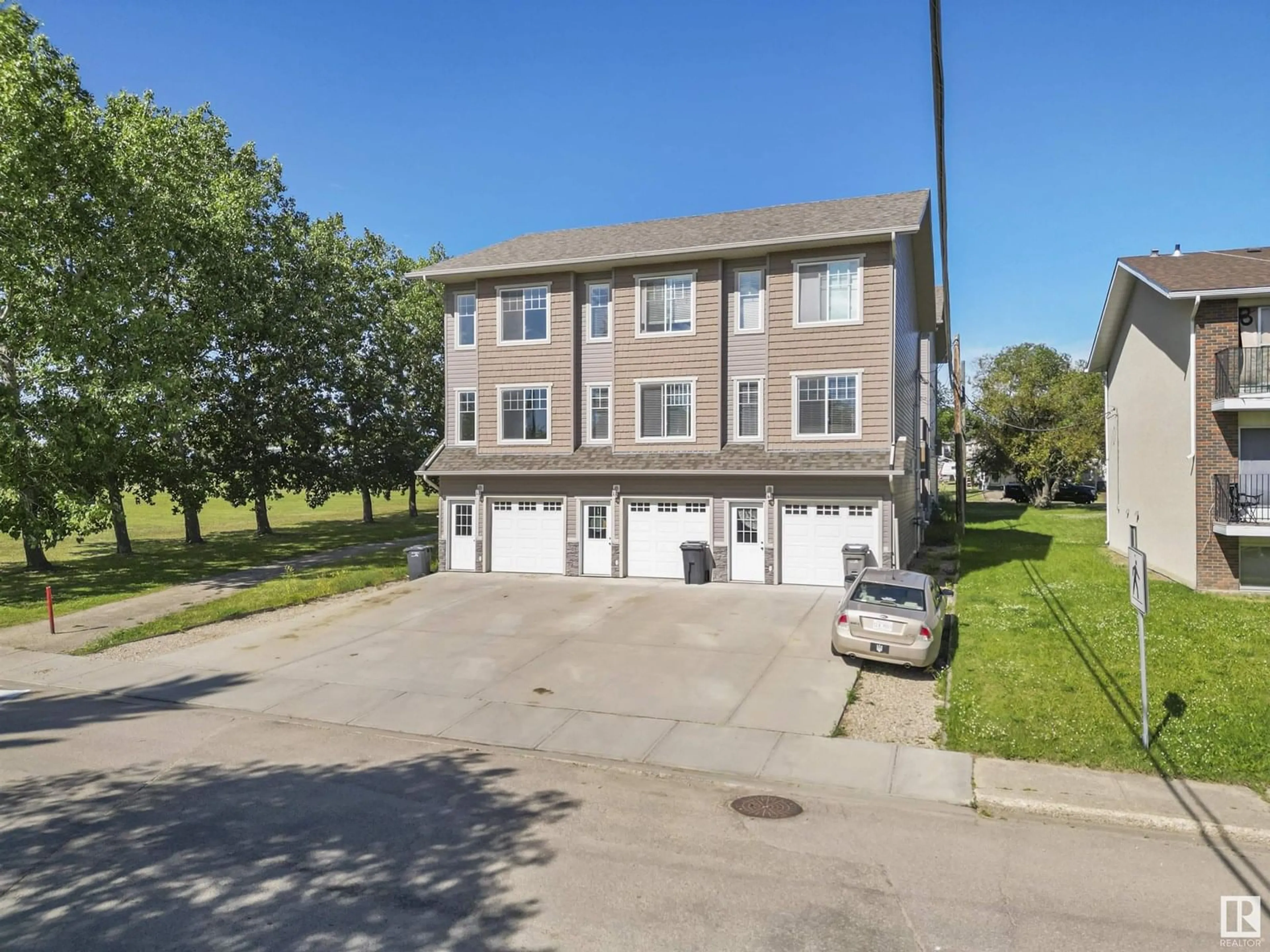A pic from outside/outdoor area/front of a property/back of a property/a pic from drone, street for #2 - 4904 44 STREET, Drayton Valley Alberta T7A1B2
