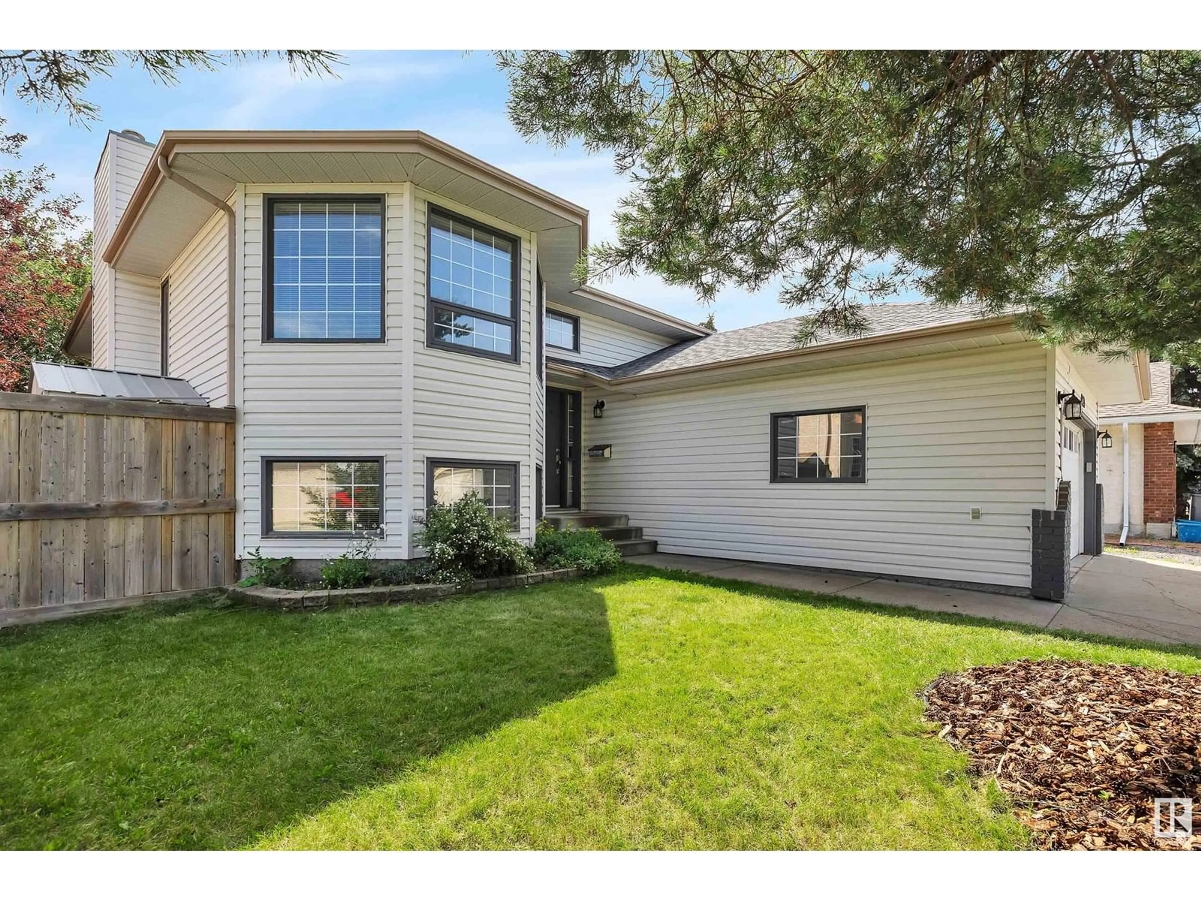 Home with vinyl exterior material, street for 4803 59 ST, Beaumont Alberta T4X1C2