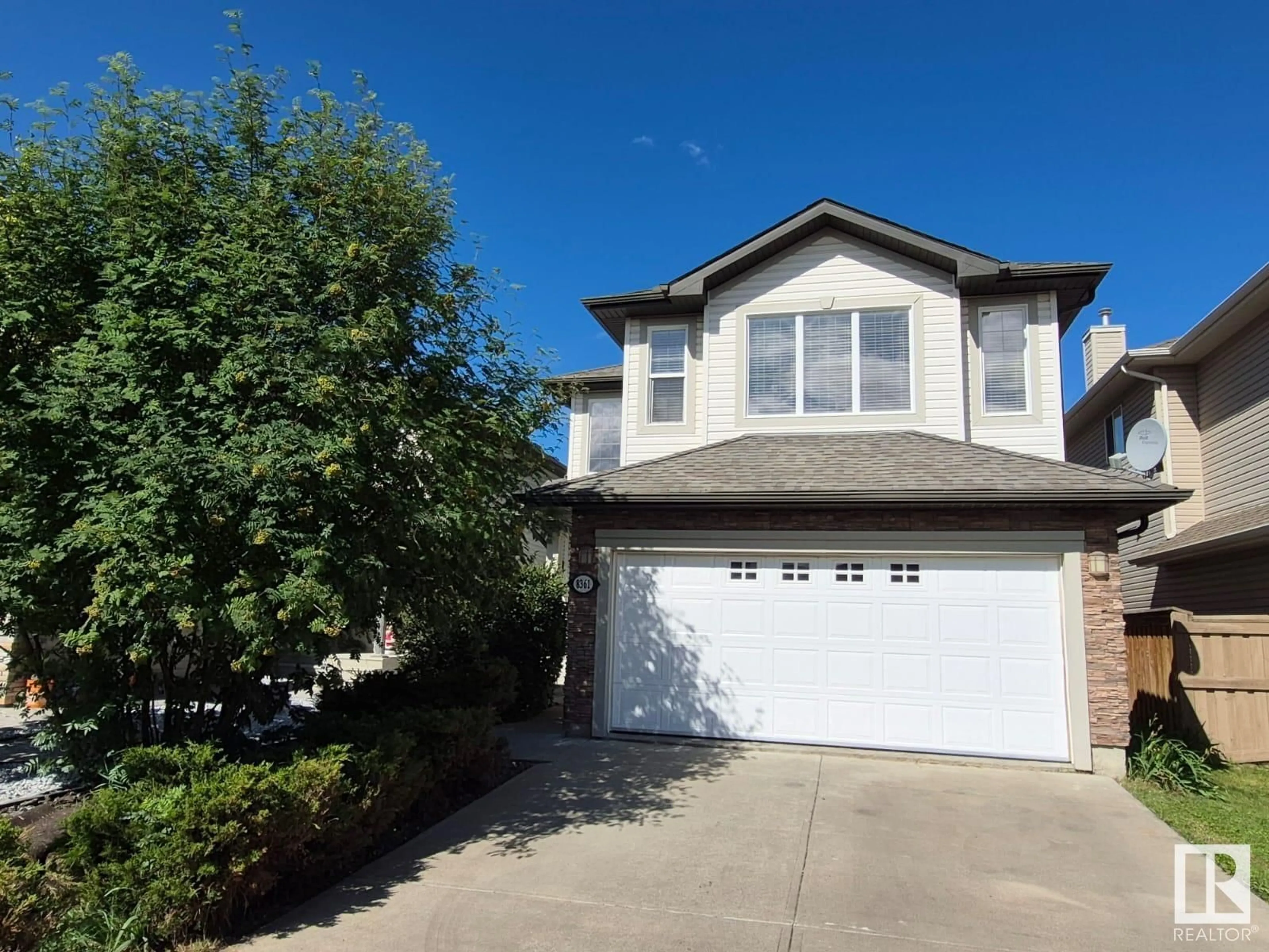Home with vinyl exterior material, street for NW NW - 8361 SHASKE CR, Edmonton Alberta T6R0B4