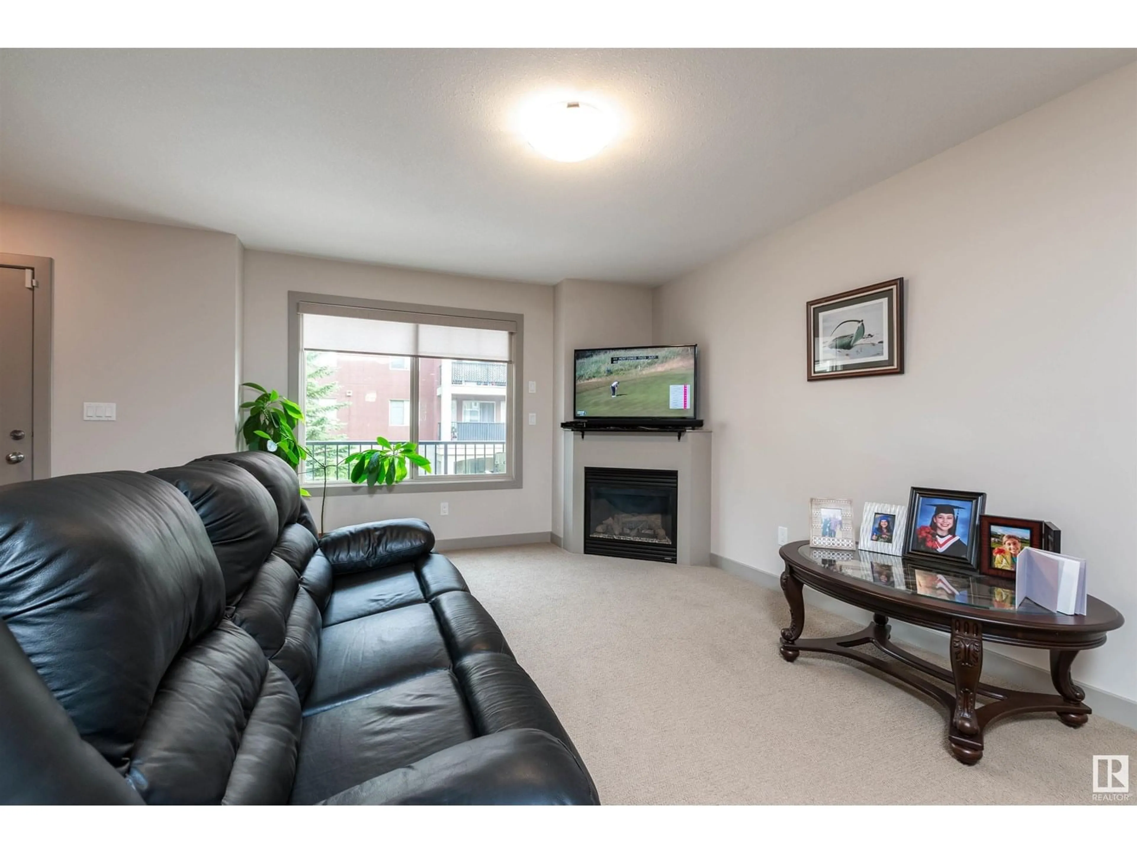 Living room with furniture, unknown for 707 - 401 PALISADES WY, Sherwood Park Alberta T8H0R7