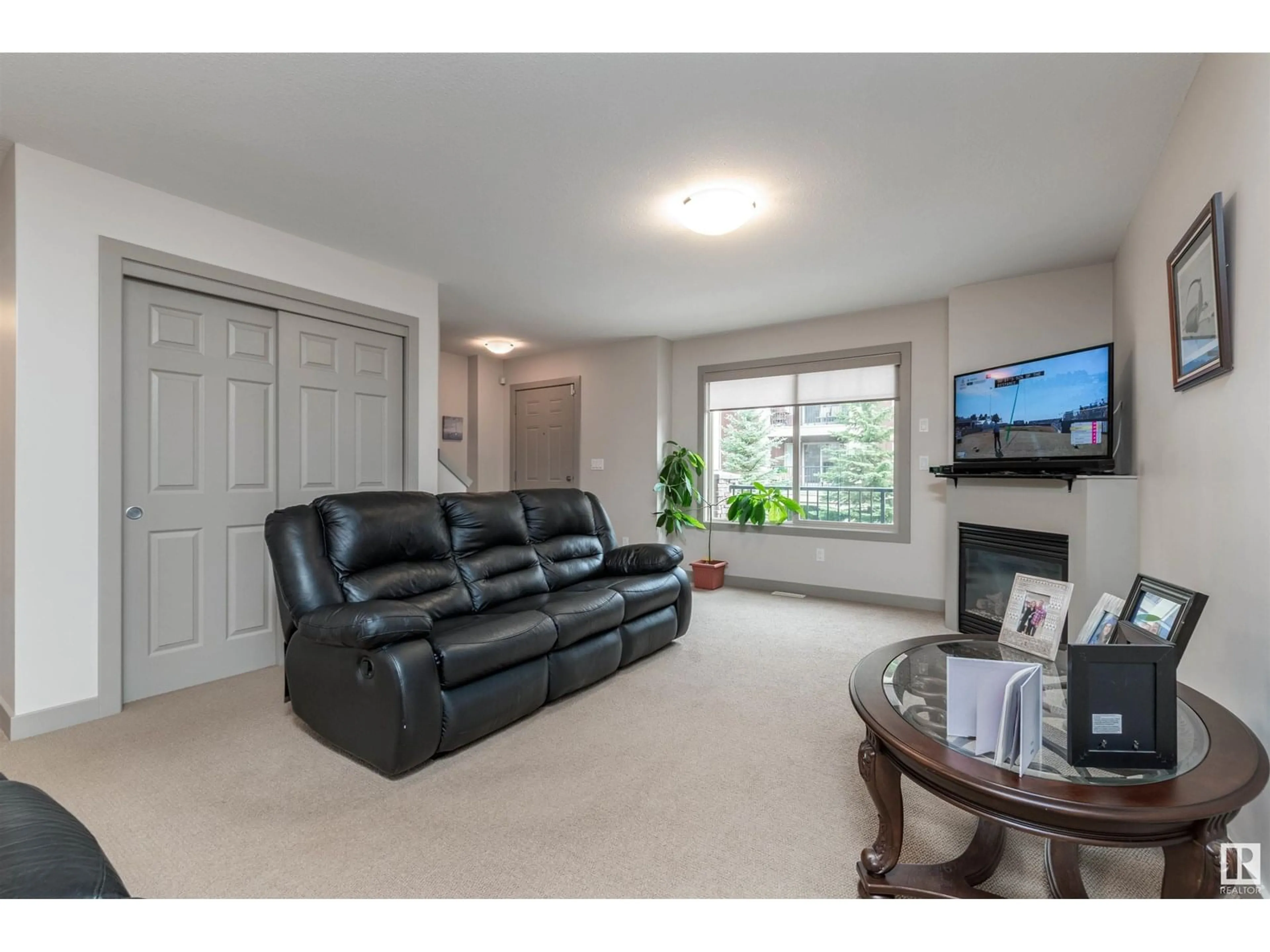 Living room with furniture, unknown for 707 - 401 PALISADES WY, Sherwood Park Alberta T8H0R7