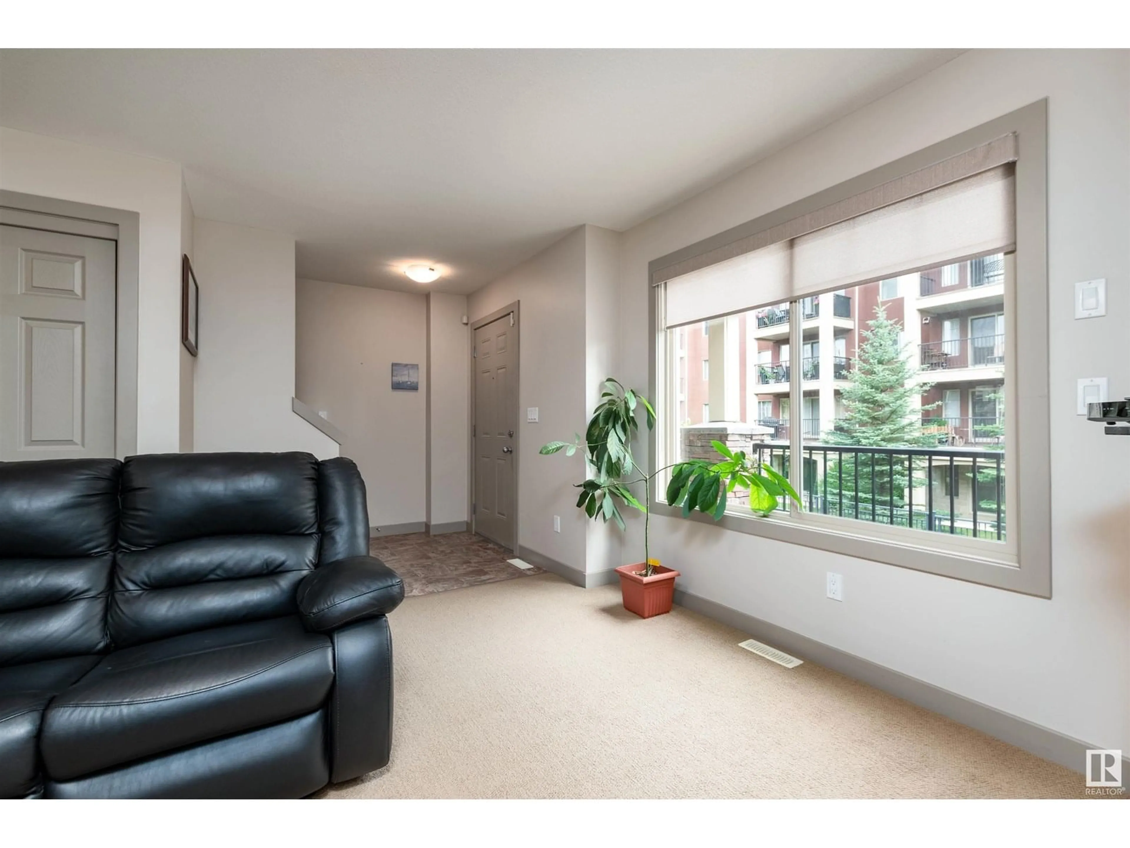 Living room with furniture, unknown for 707 - 401 PALISADES WY, Sherwood Park Alberta T8H0R7