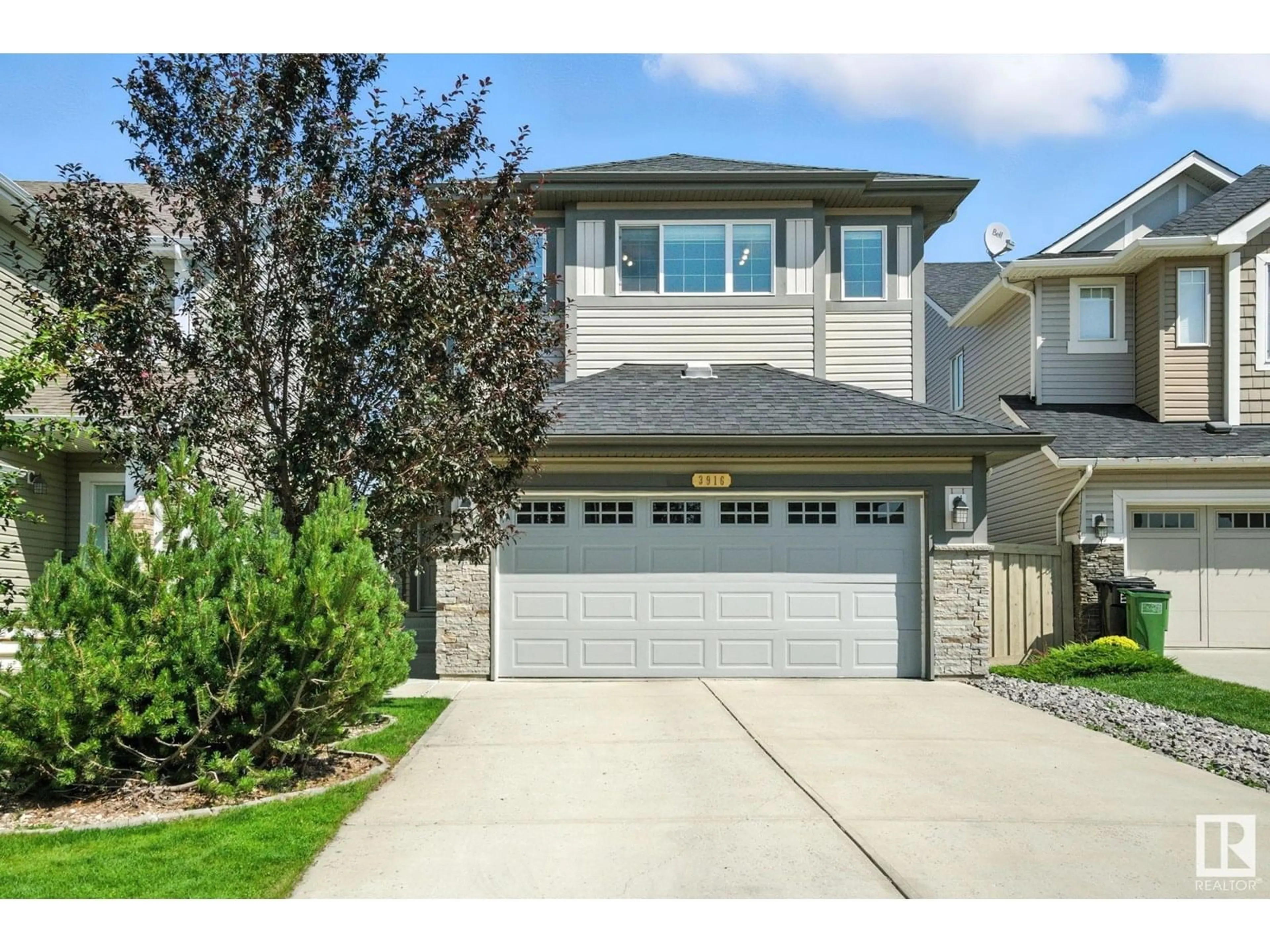 Home with vinyl exterior material, street for 3916 AGAR CO SW, Edmonton Alberta T6W2G3
