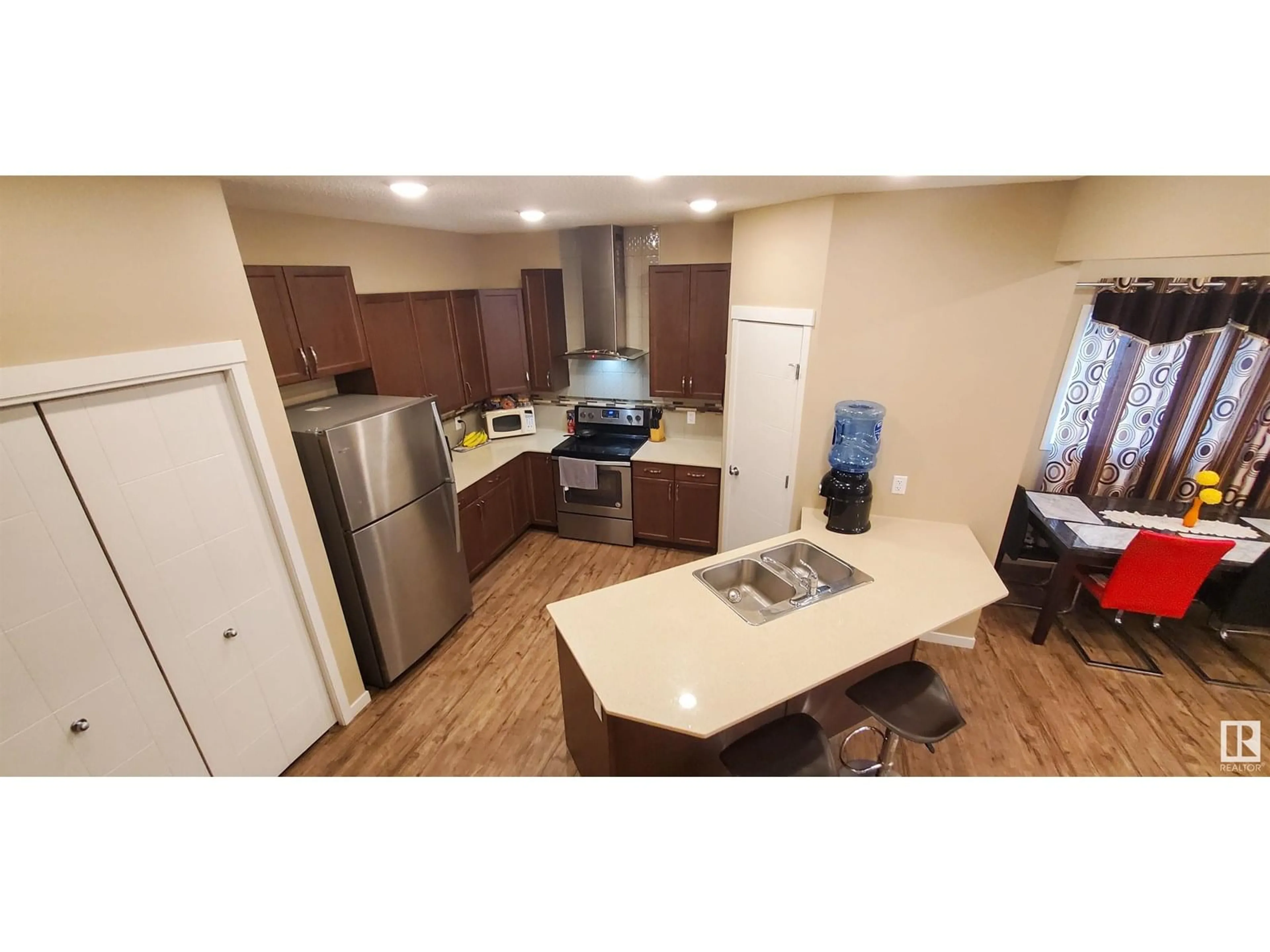 Open concept kitchen, unknown for SW - 4436 ANNETT CM, Edmonton Alberta T6W2V9