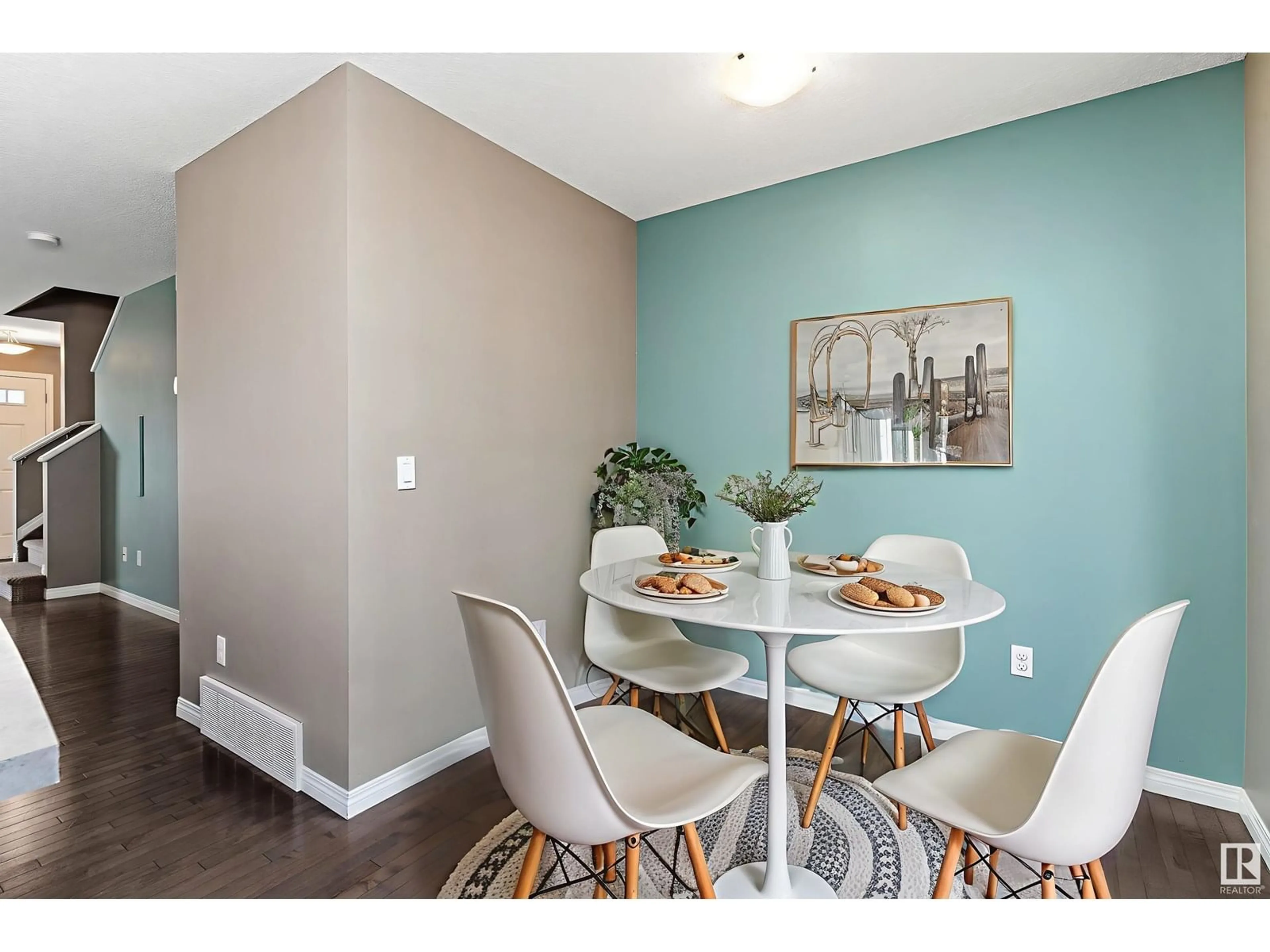 Dining room, wood/laminate floor for 153 - 1804 70 ST, Edmonton Alberta T6X0H4