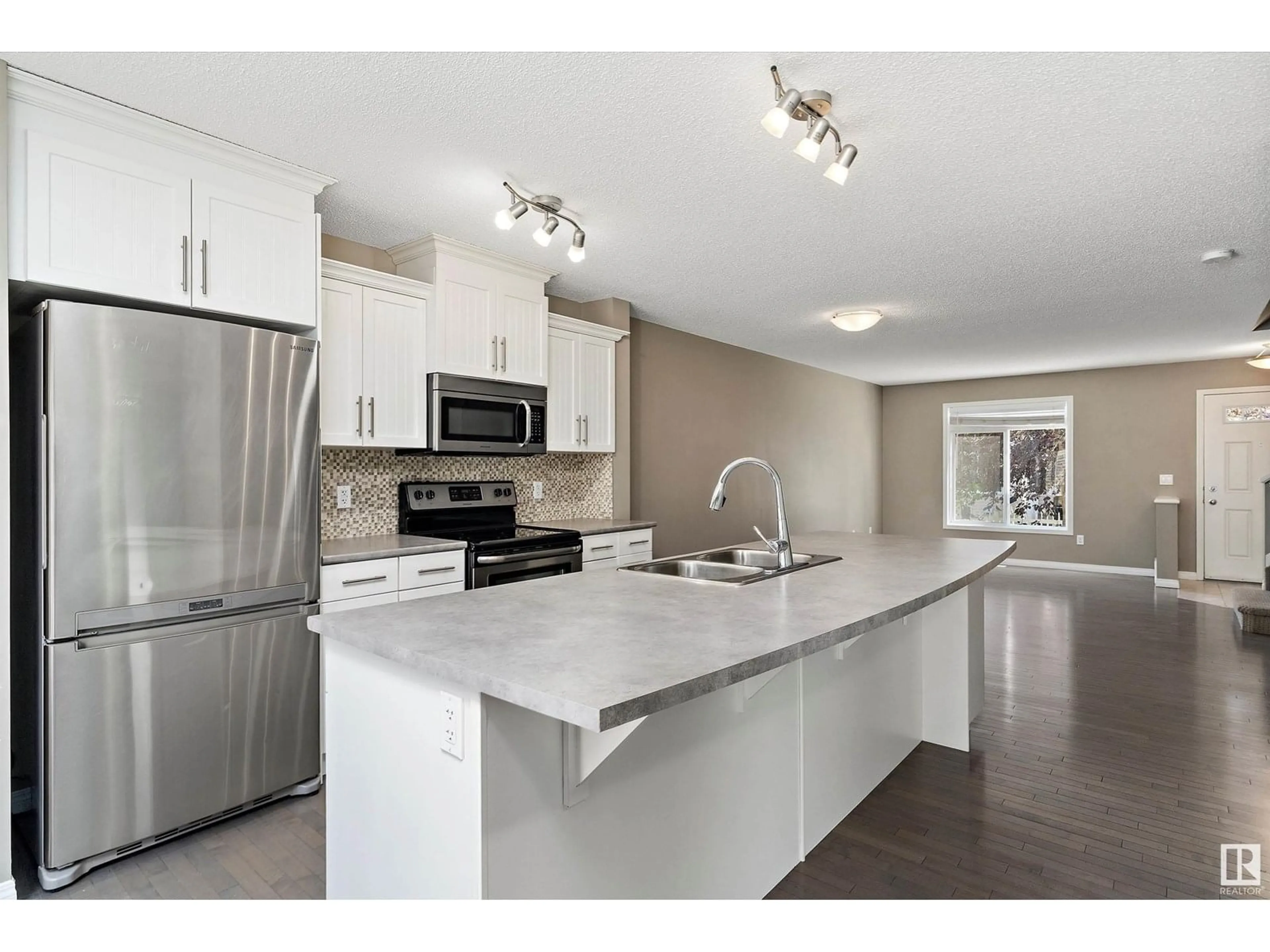 Open concept kitchen, unknown for 153 - 1804 70 ST, Edmonton Alberta T6X0H4