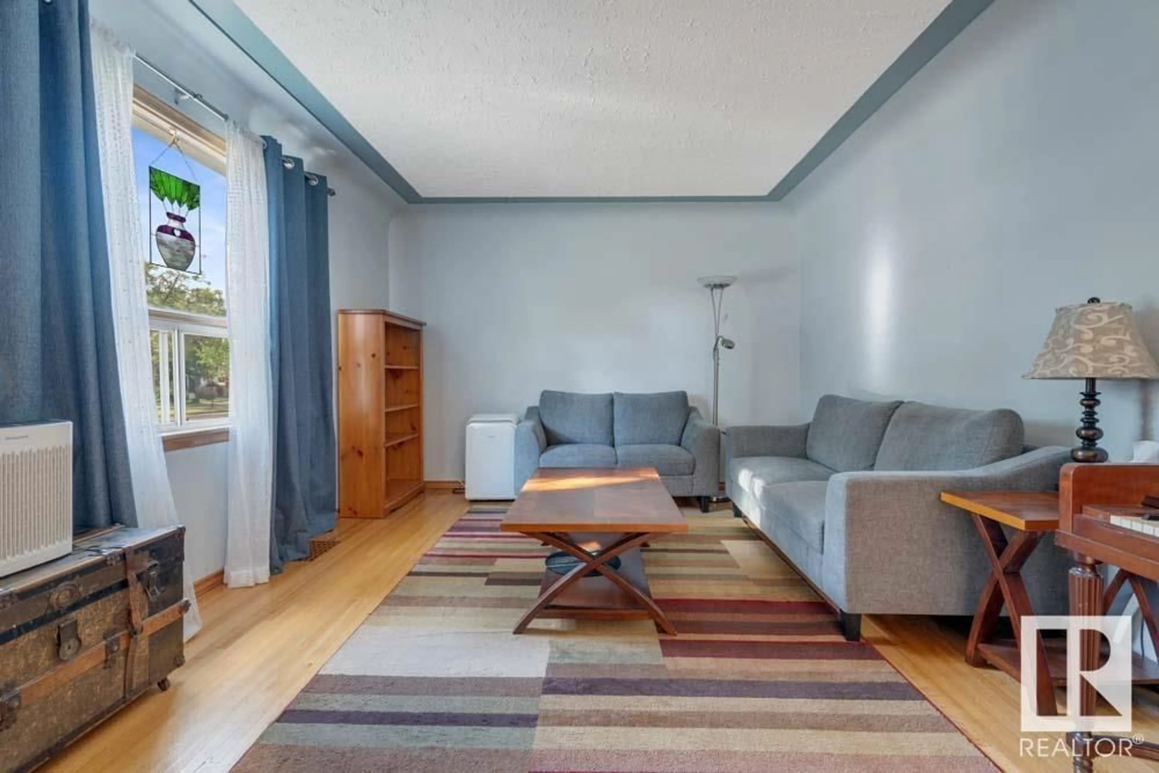 Living room with furniture, unknown for 9539 85 ST, Edmonton Alberta T6C3E1