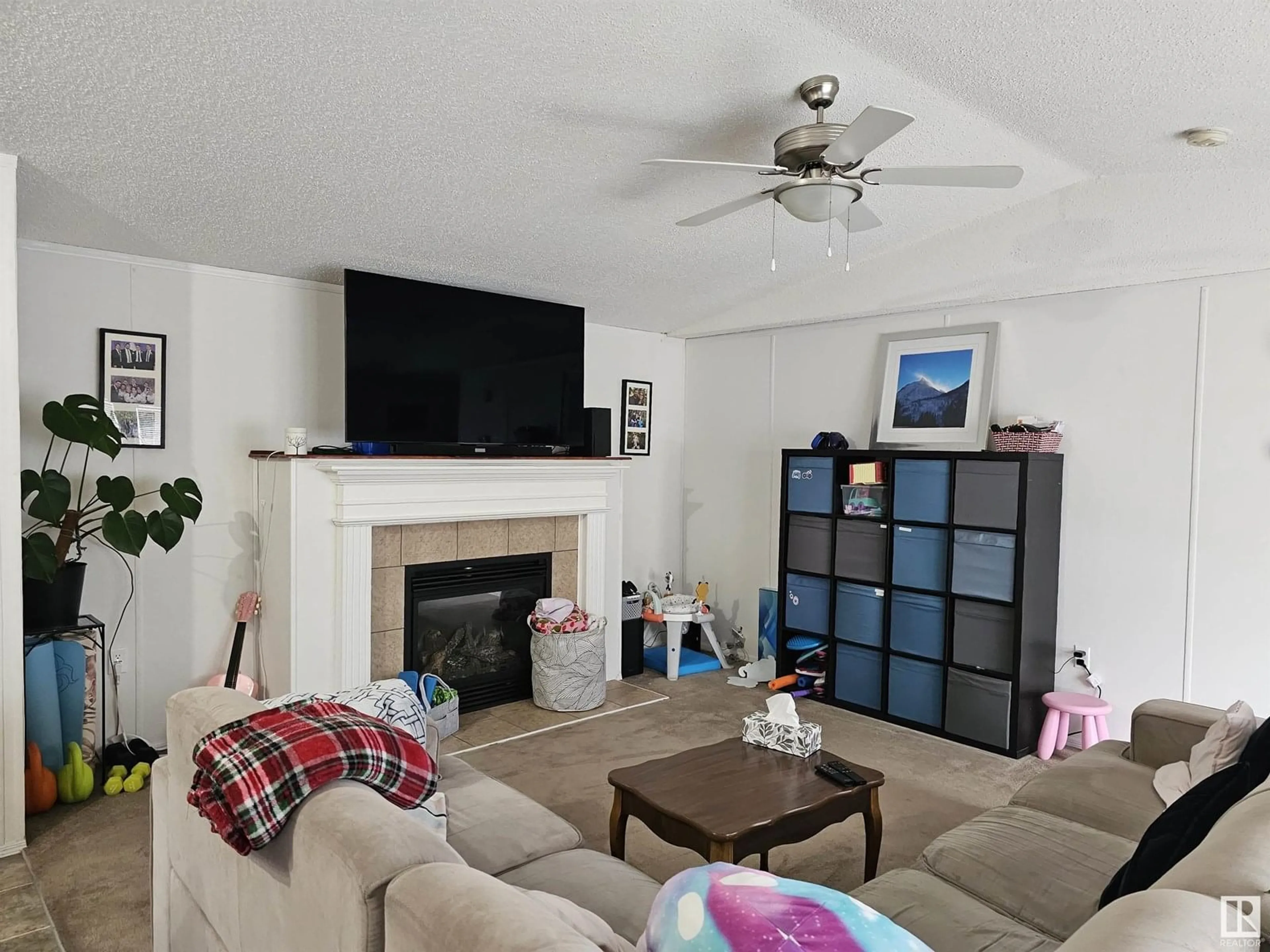 Living room with furniture, unknown for 53222 - 1531 RR272, Rural Parkland County Alberta T7X4M4