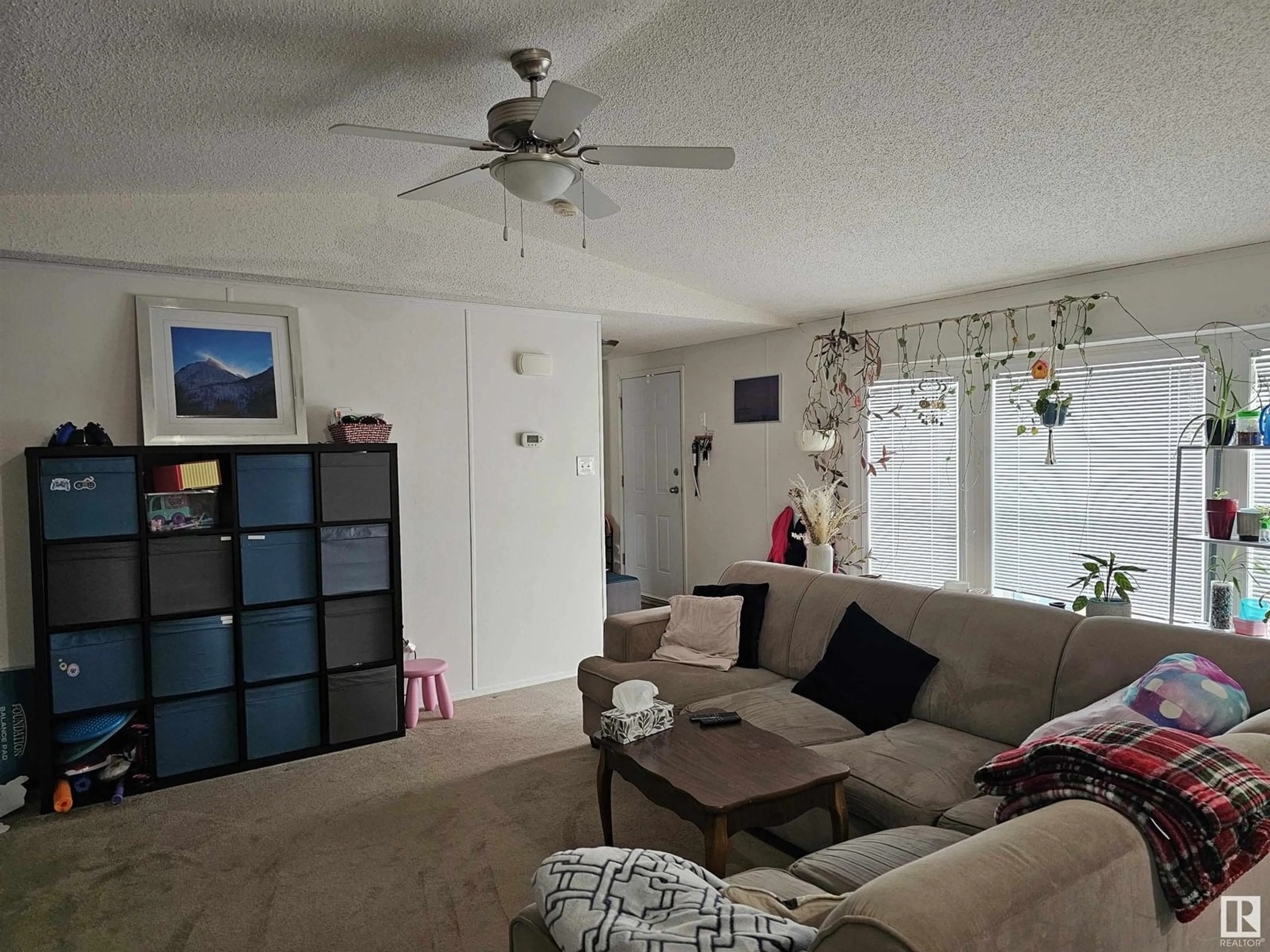 Living room with furniture, unknown for 53222 - 1531 RR272, Rural Parkland County Alberta T7X4M4