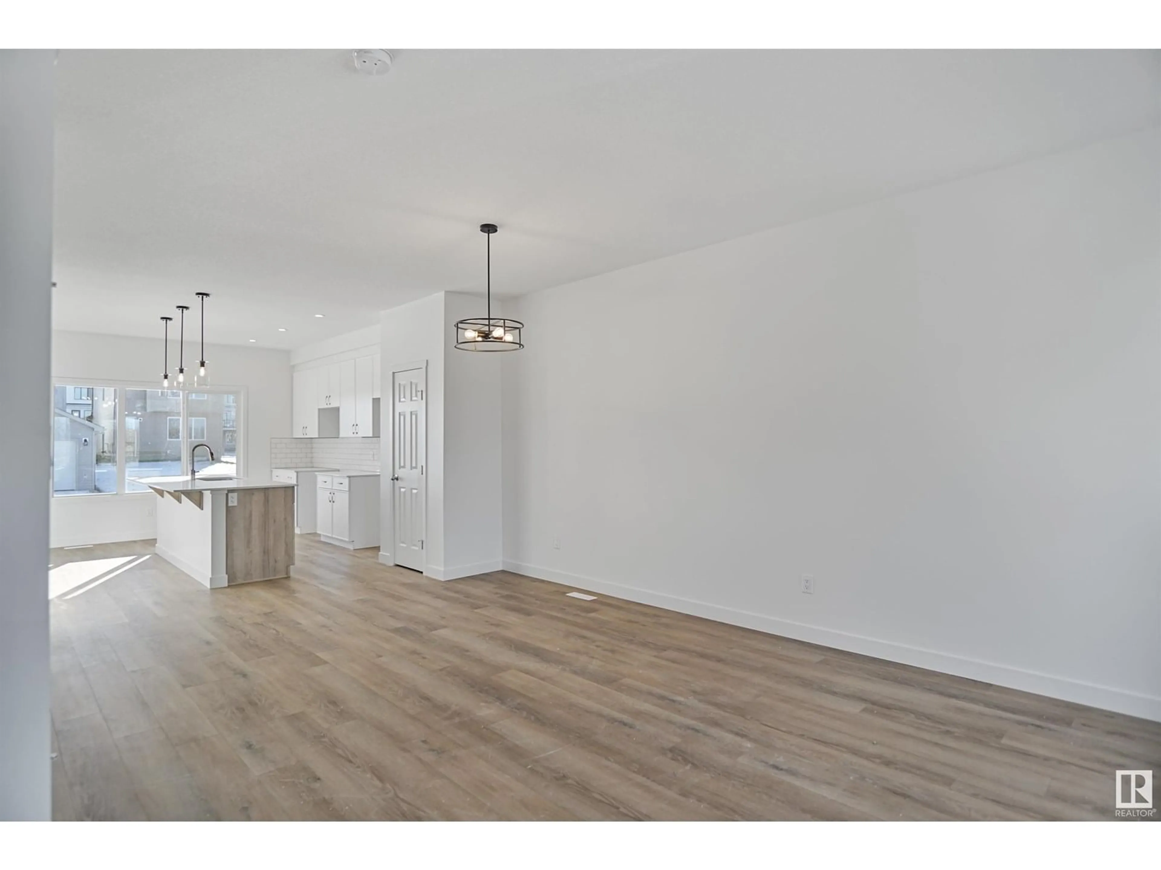 Open concept kitchen, wood/laminate floor for 1076 MCLEOD AV, Spruce Grove Alberta T7X2Z7