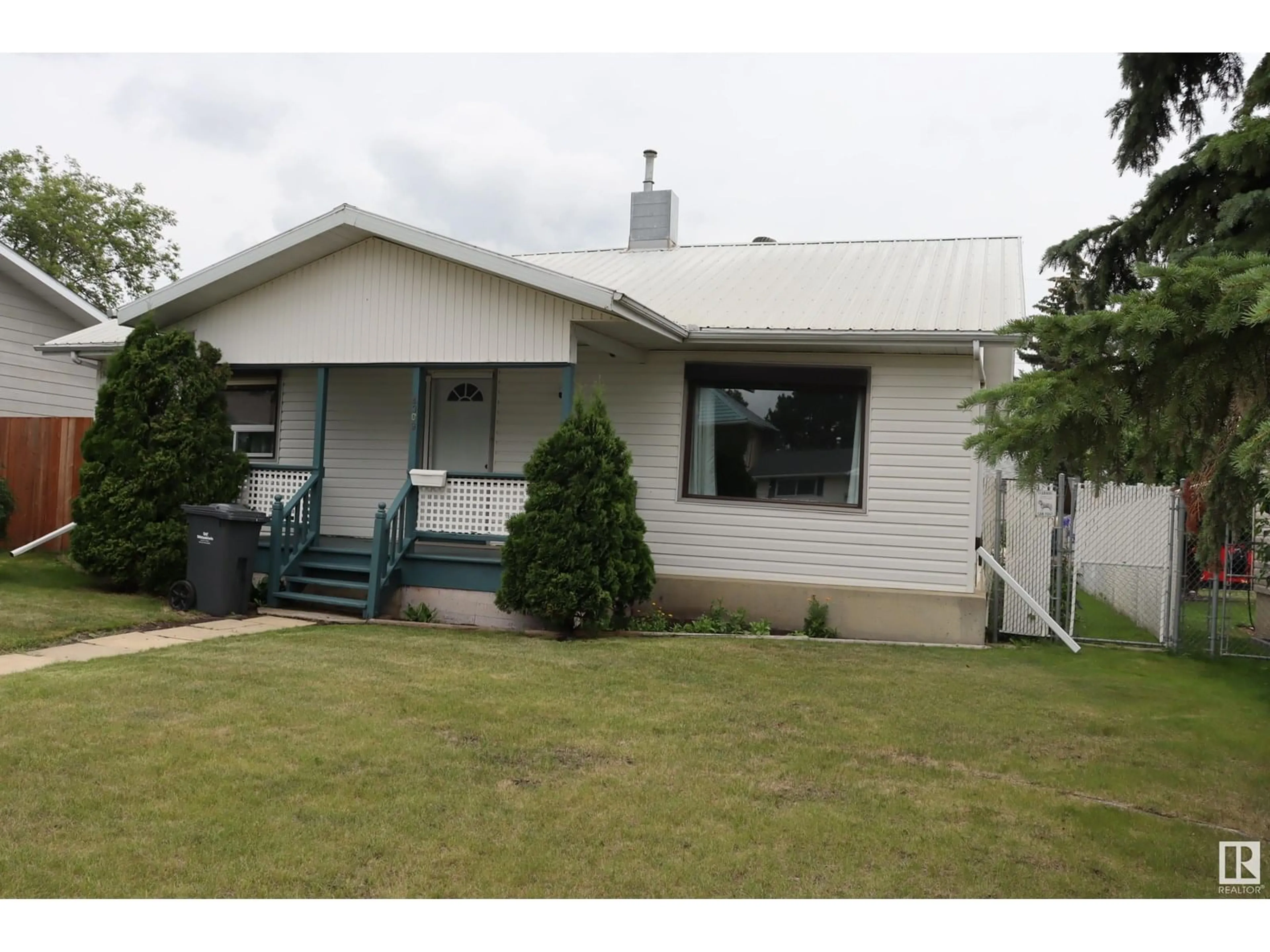 Home with vinyl exterior material, street for 4309 53 ST, Wetaskiwin Alberta T9A1P9