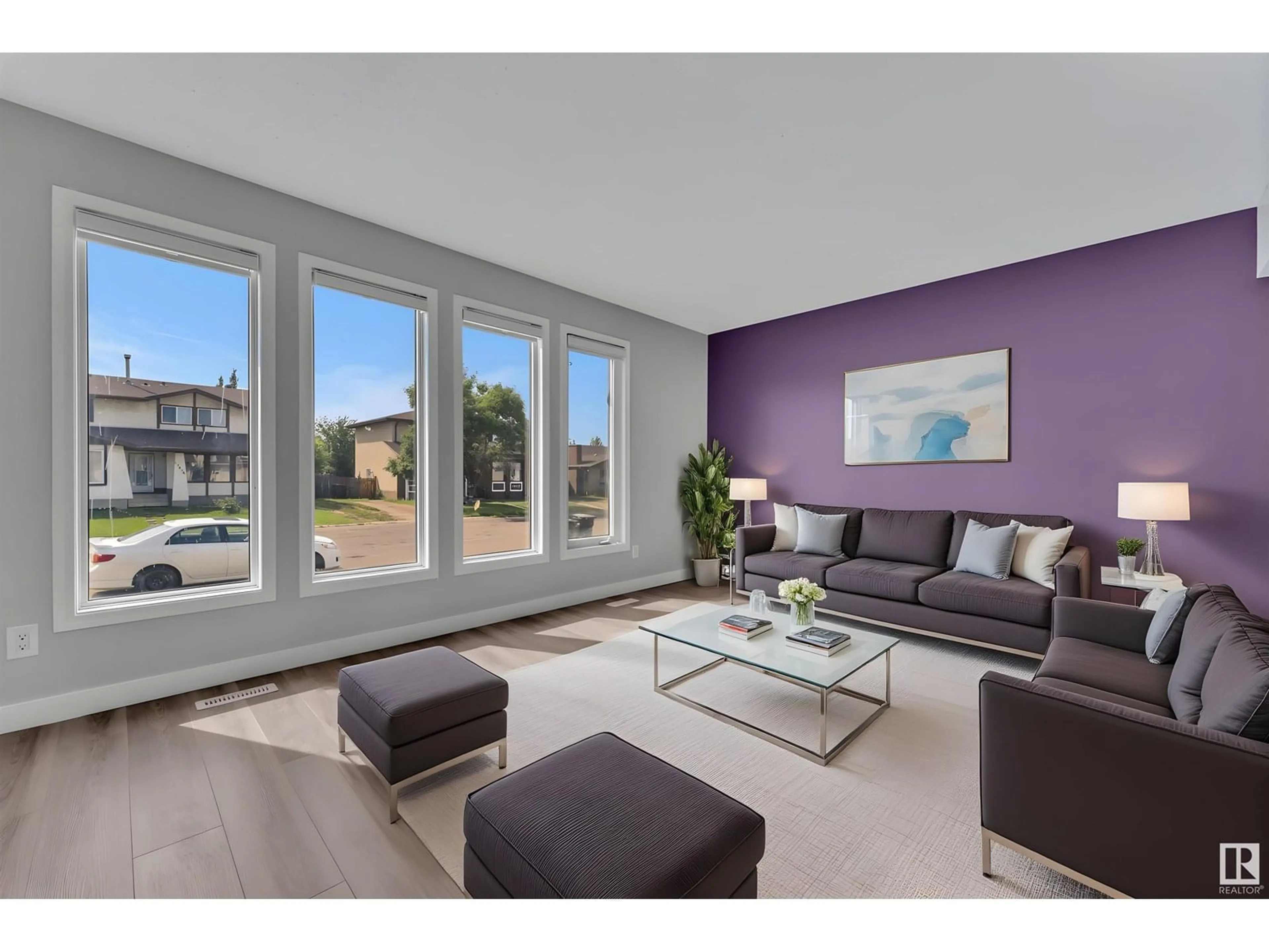 Living room with furniture, wood/laminate floor for NW - 13891 114 ST, Edmonton Alberta T5X4A1