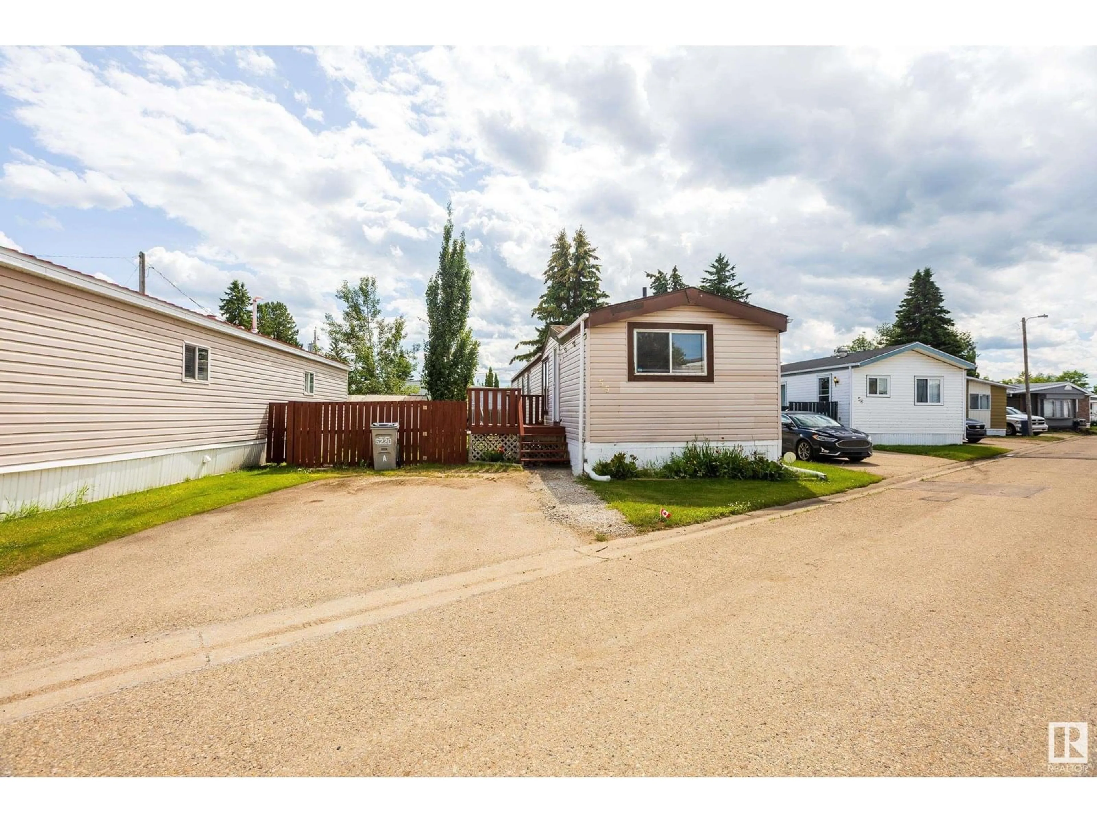 A pic from outside/outdoor area/front of a property/back of a property/a pic from drone, street for 55 - 10410 101A ST, Morinville Alberta T8R1B1