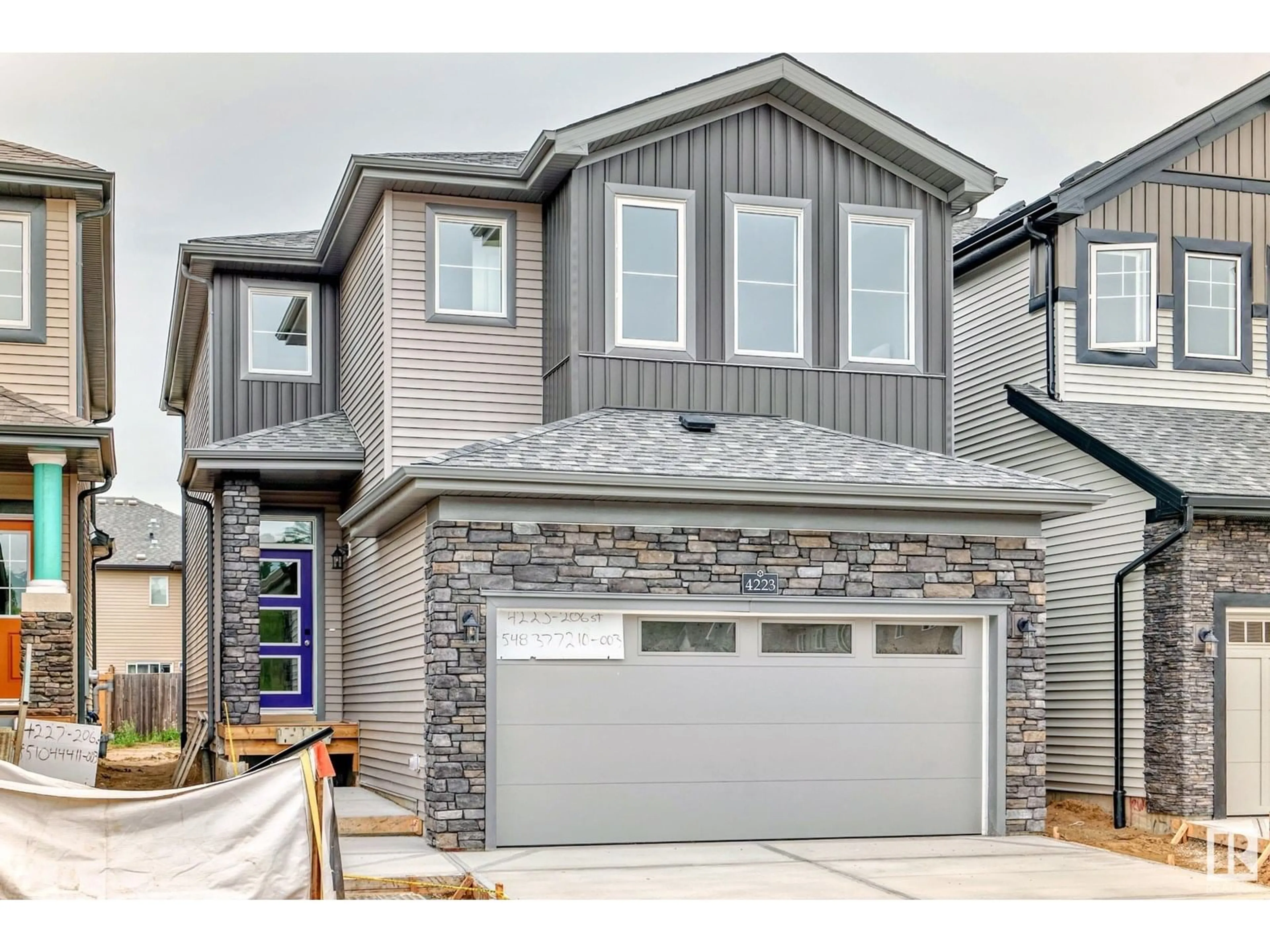 Home with brick exterior material, street for NW - 4223 206 ST, Edmonton Alberta T6M3E3