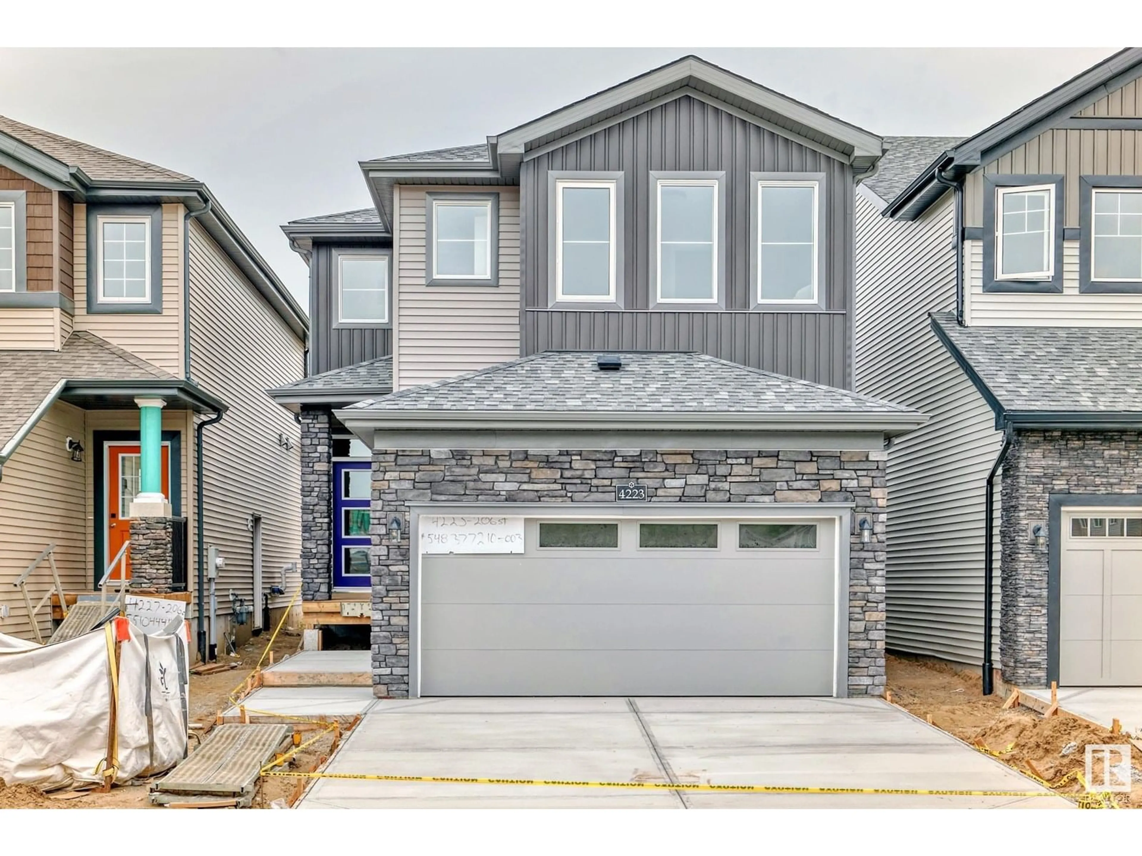 Home with vinyl exterior material, street for NW - 4223 206 ST, Edmonton Alberta T6M3E3
