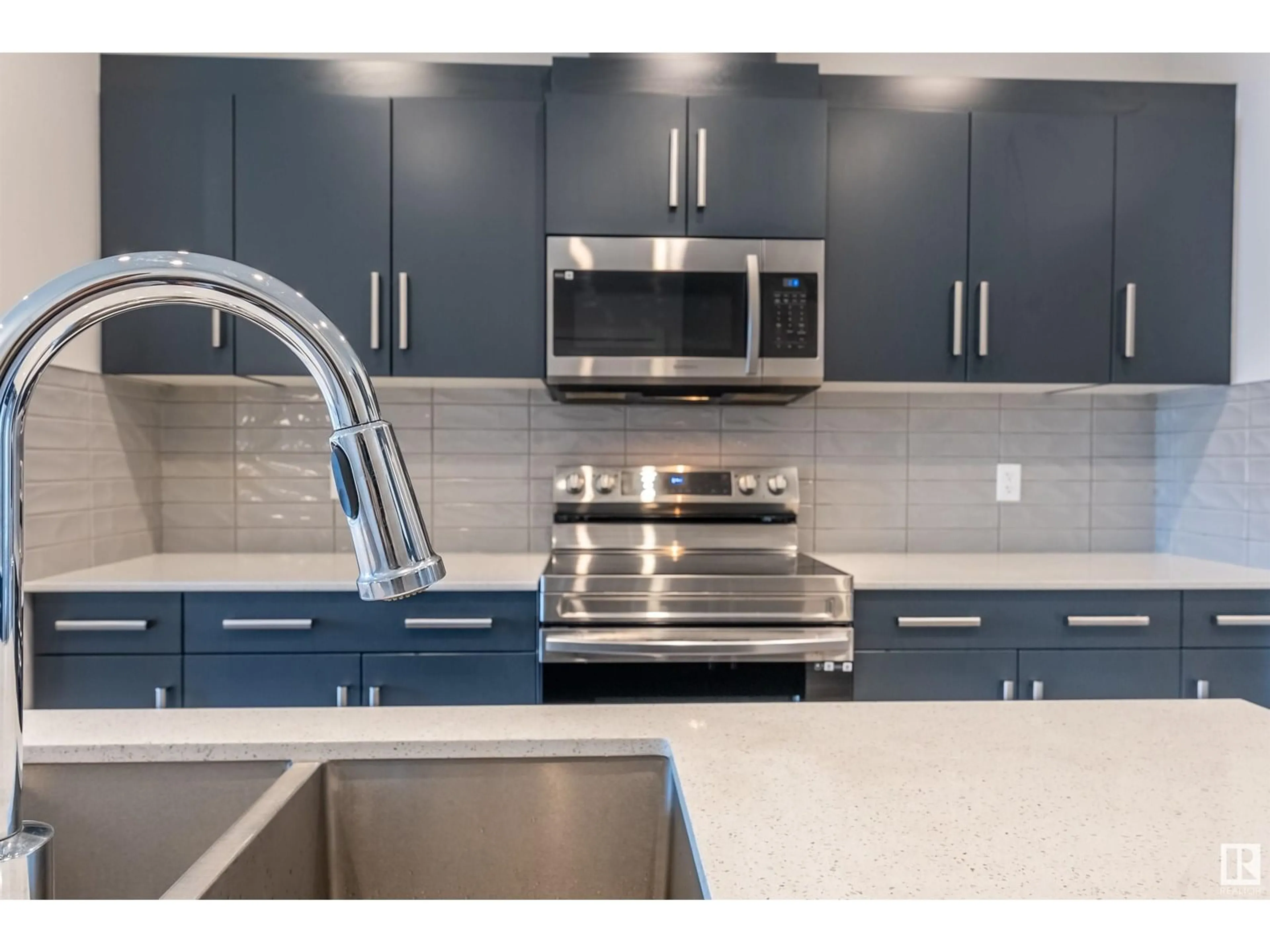 Open concept kitchen, ceramic/tile floor for 308 36 AV, Edmonton Alberta T6T2P9