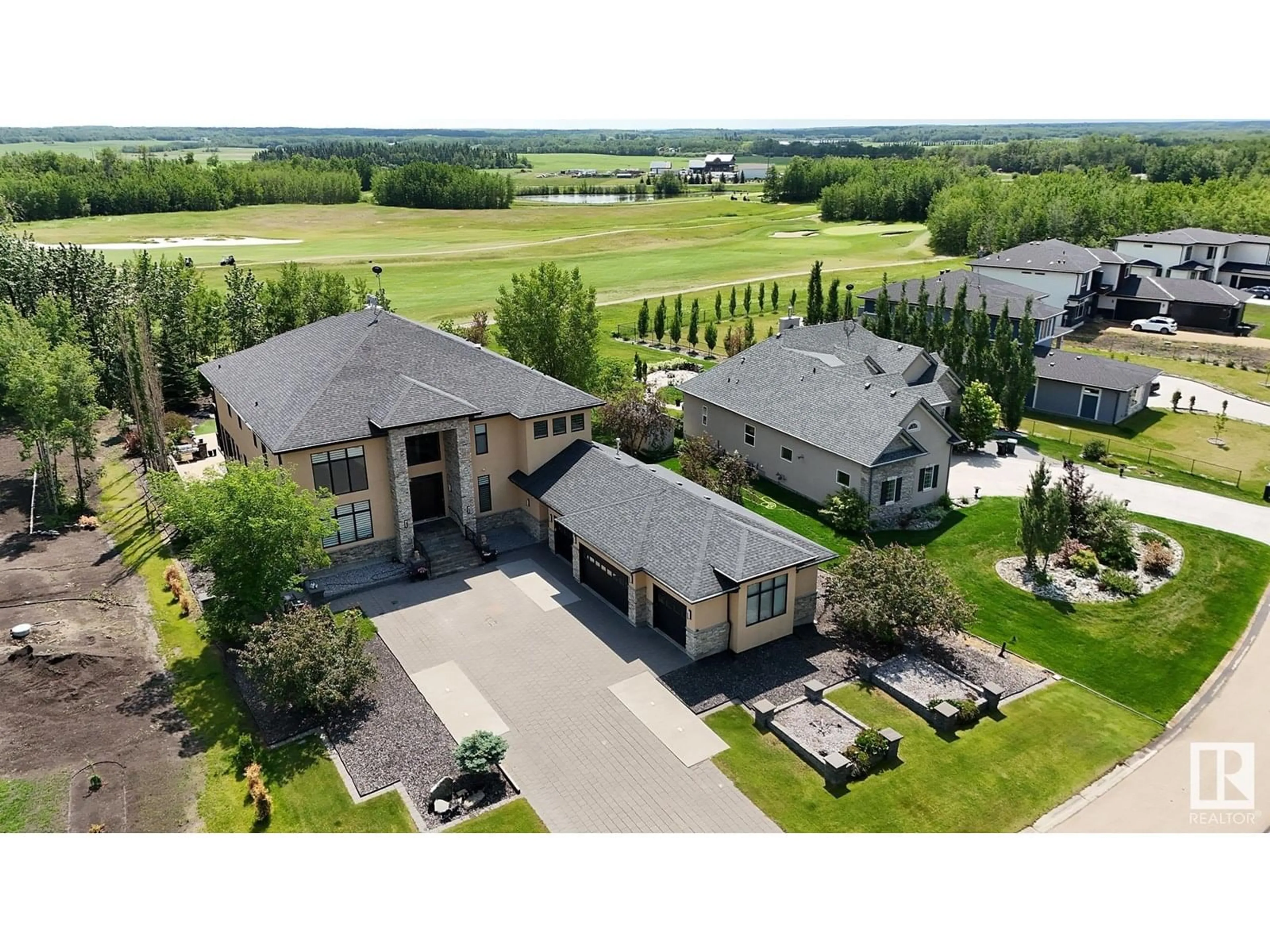 A pic from outside/outdoor area/front of a property/back of a property/a pic from drone, unknown for 51025 - 36 RGE ROAD 222, Rural Strathcona County Alberta T8C1J5