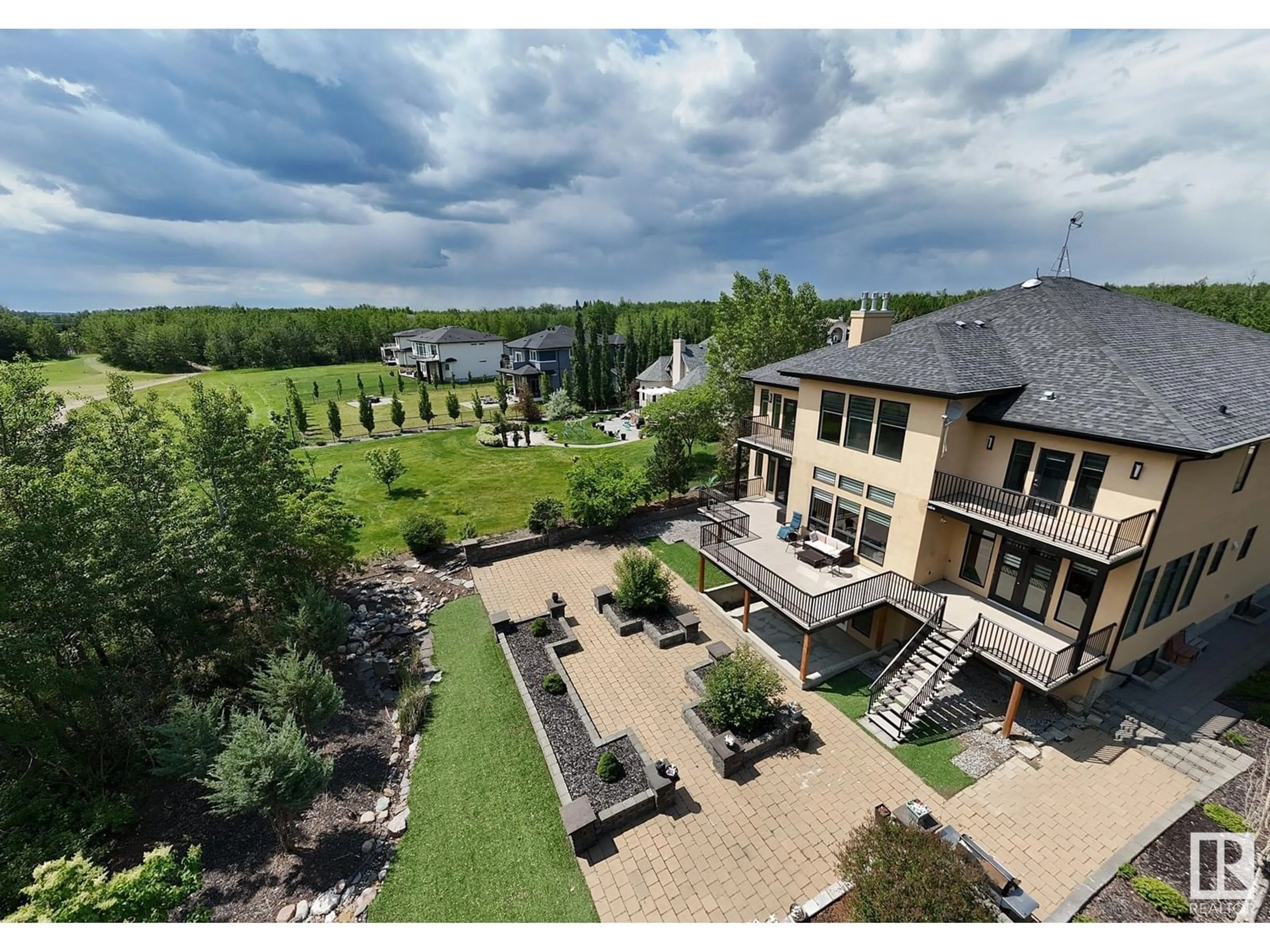 A pic from outside/outdoor area/front of a property/back of a property/a pic from drone, water/lake/river/ocean view for 51025 - 36 RGE ROAD 222, Rural Strathcona County Alberta T8C1J5