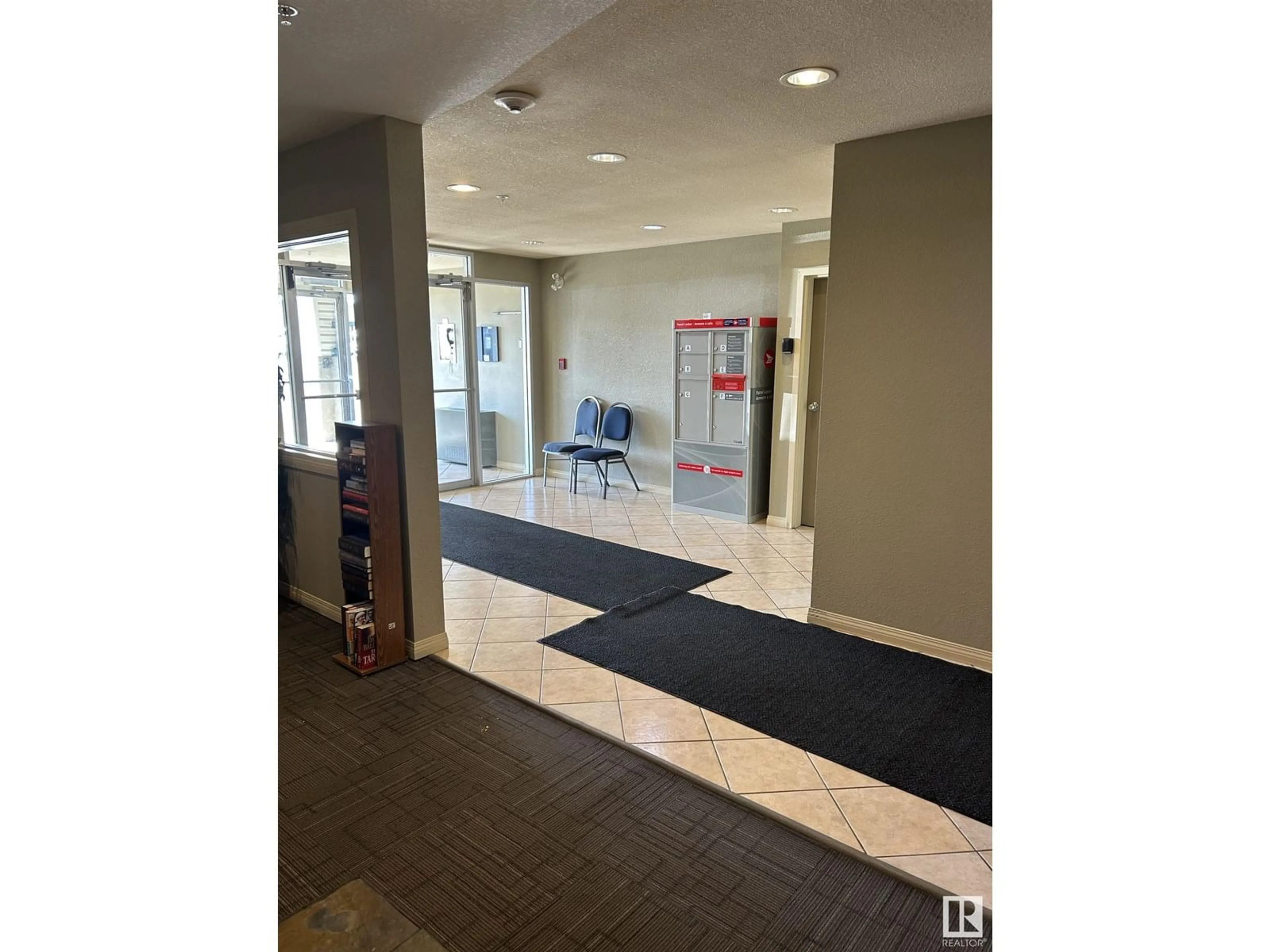 Indoor foyer for #104 - 2430 GUARDIAN RD, Edmonton Alberta T5J6X9