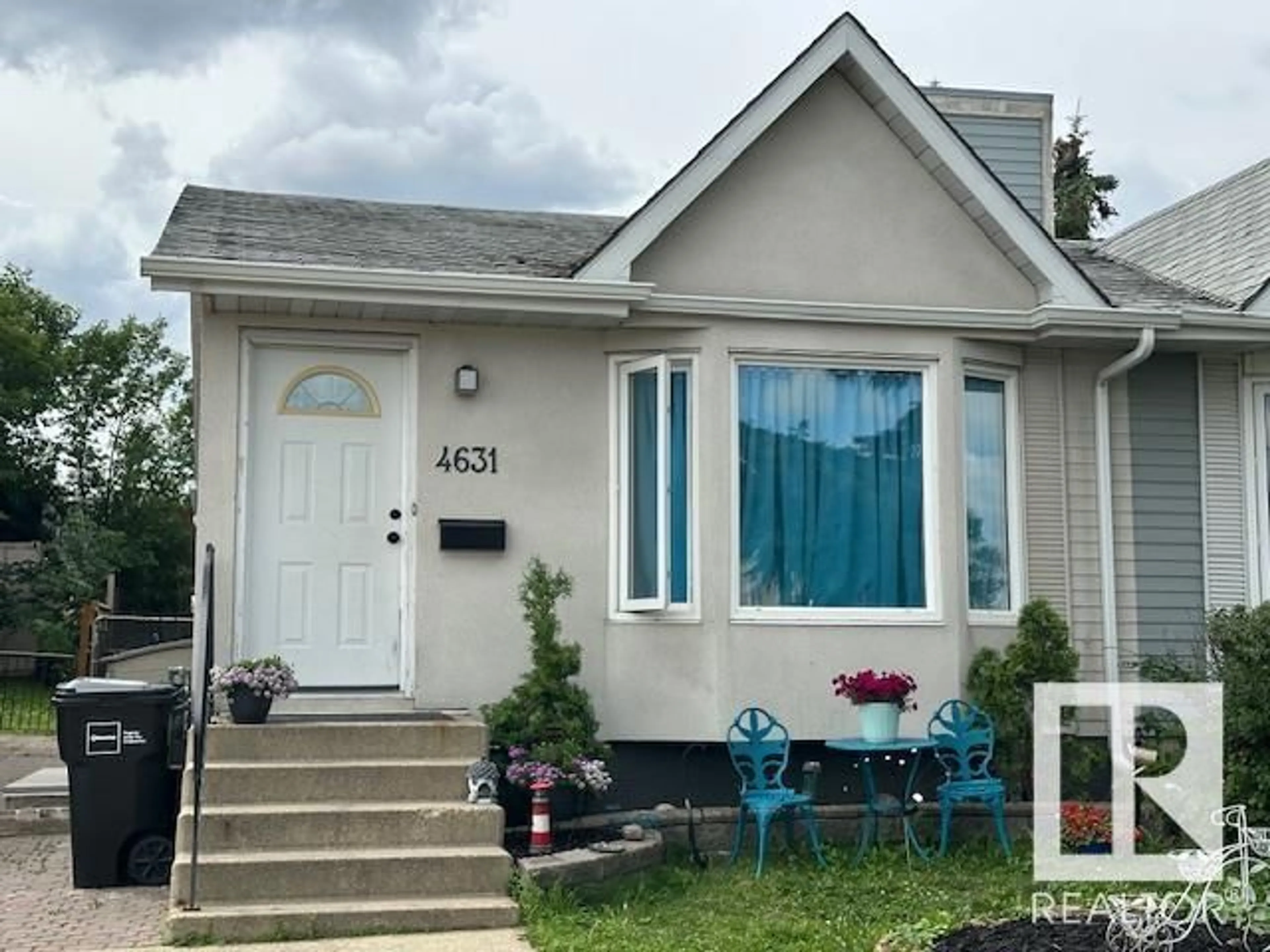 Home with vinyl exterior material, street for 4631 126 AV, Edmonton Alberta T5A4L1