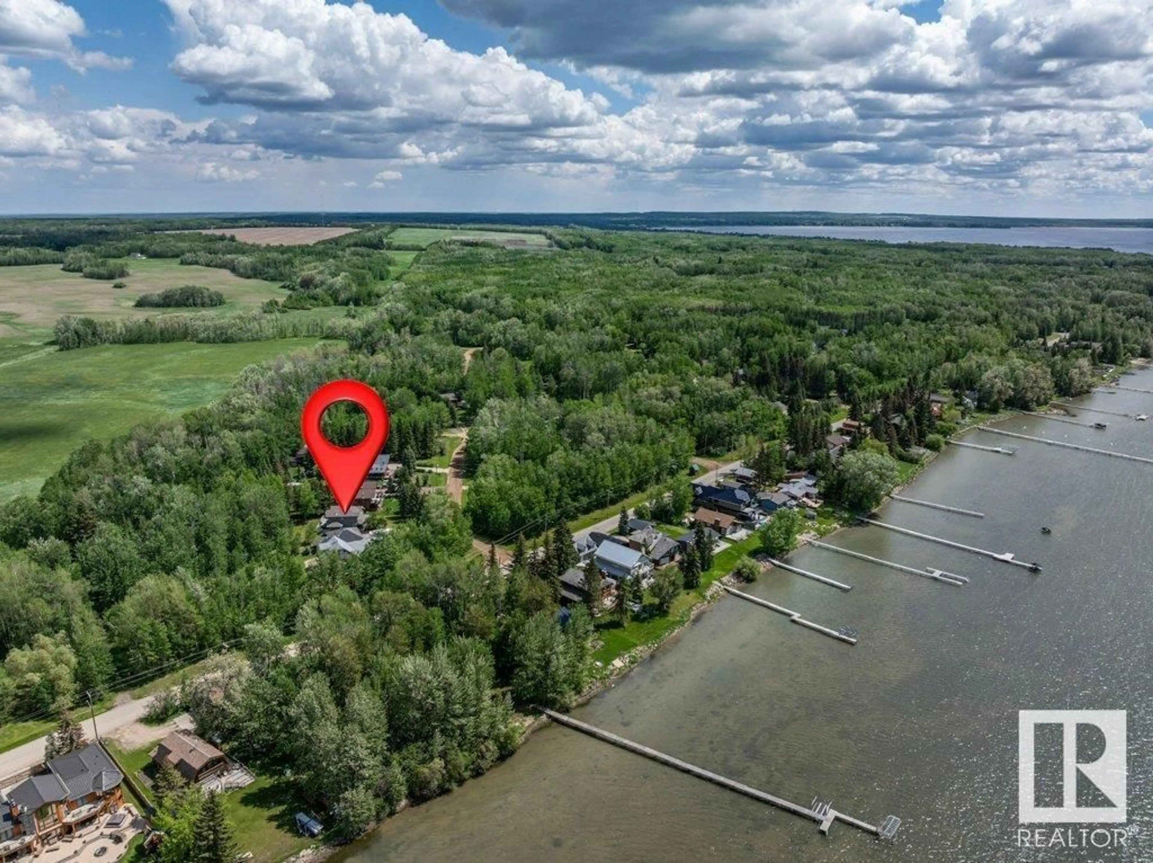 A pic from outside/outdoor area/front of a property/back of a property/a pic from drone, water/lake/river/ocean view for B20 JOHNSONIA, Rural Leduc County Alberta T0C2C0