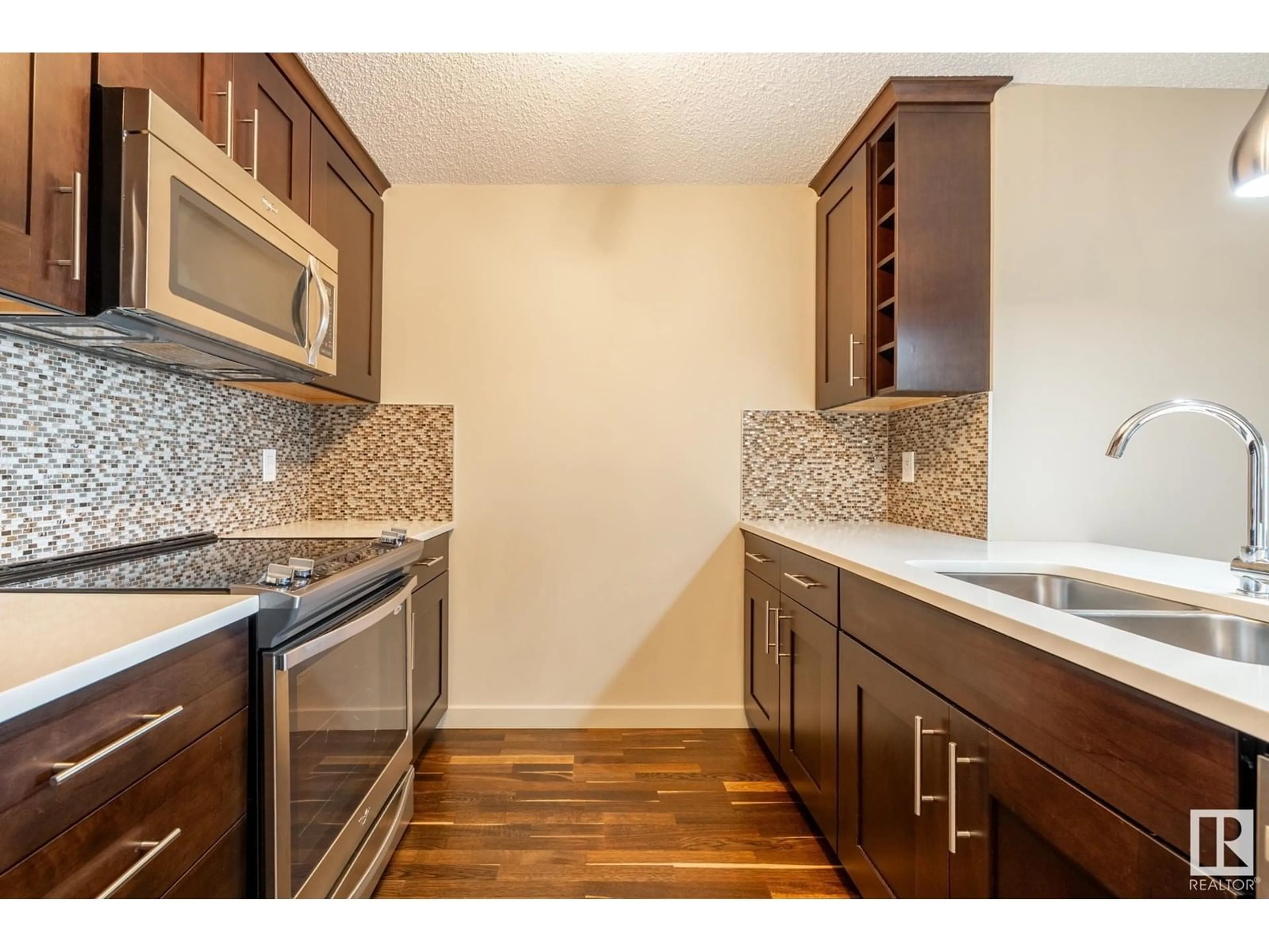 Standard kitchen, wood/laminate floor for #116 - 4008 SAVARYN DR, Edmonton Alberta T6X2E5