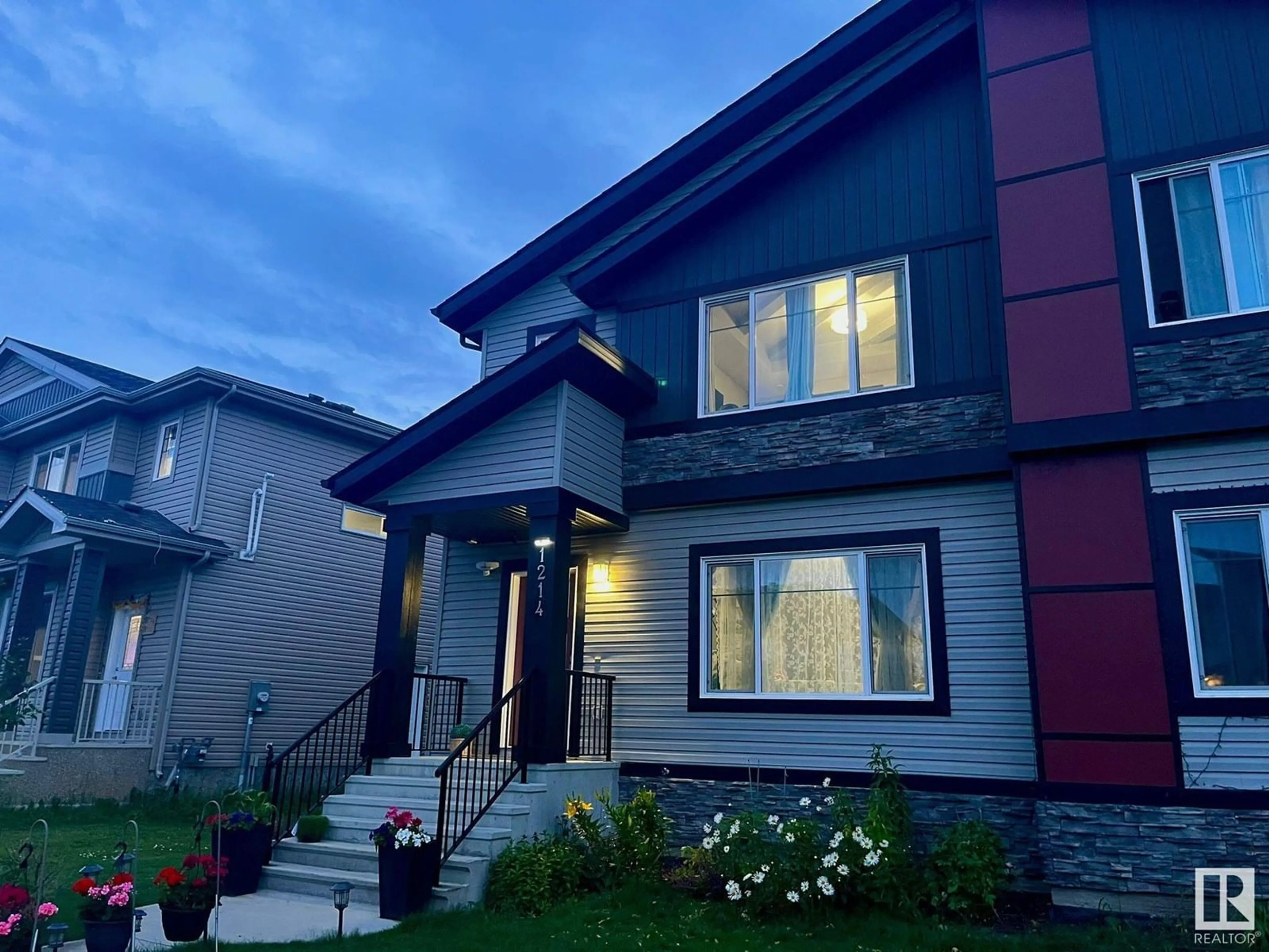 Home with vinyl exterior material, street for 1214 163 STREET, Edmonton Alberta T6W3K4