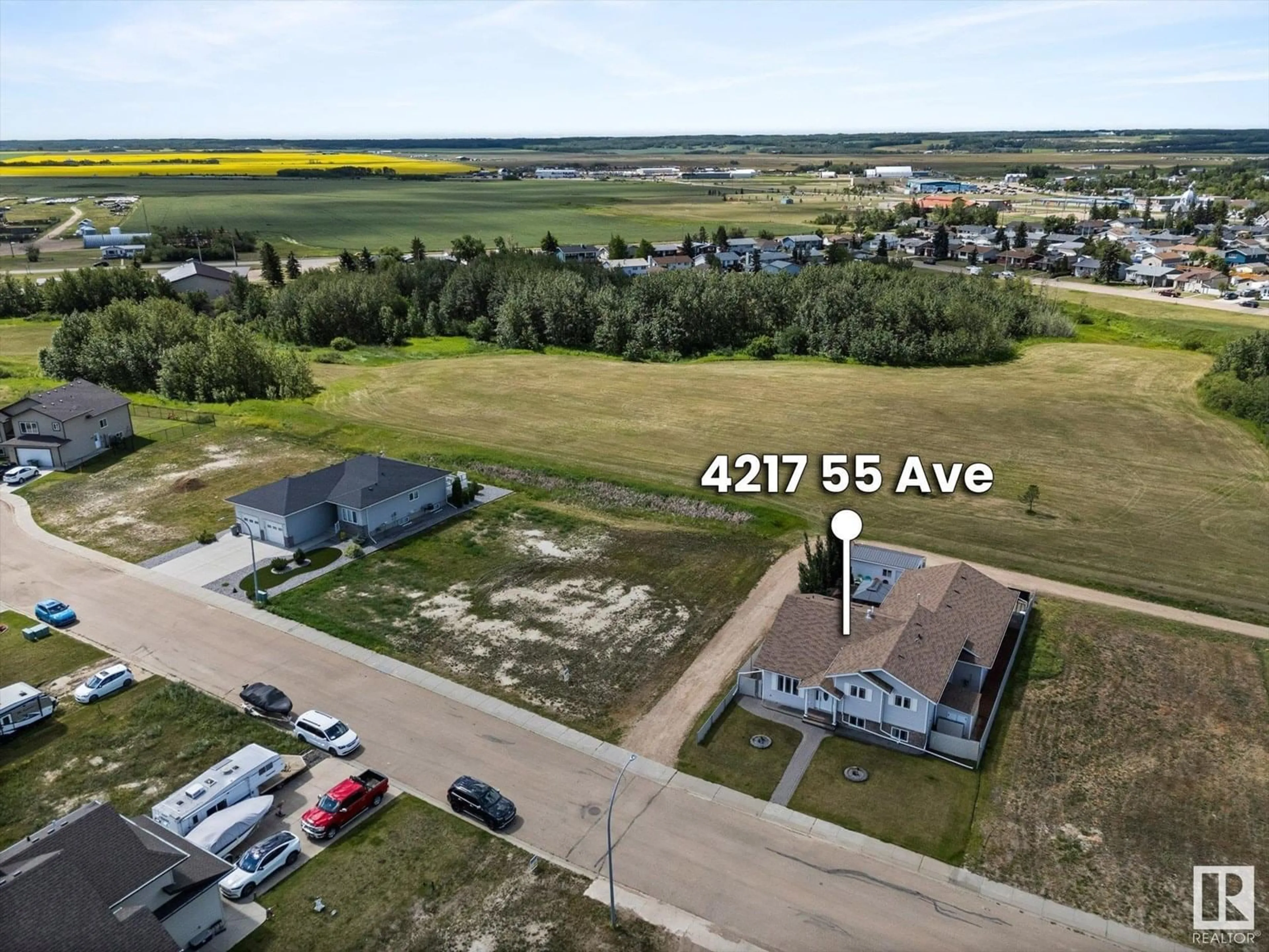 A pic from outside/outdoor area/front of a property/back of a property/a pic from drone, water/lake/river/ocean view for 4217 55 AV, Lamont Alberta T0B2R0