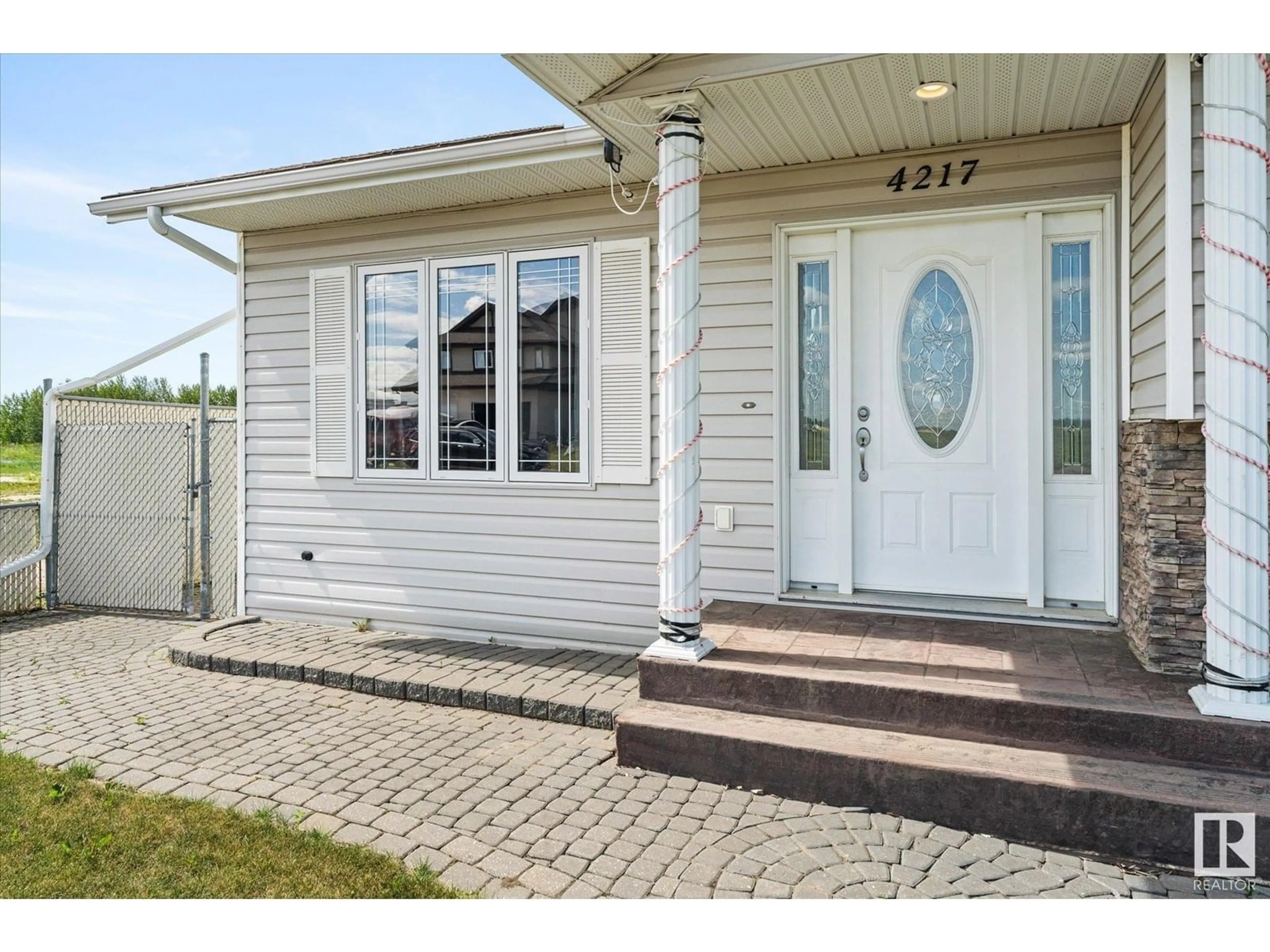 Home with vinyl exterior material, street for 4217 55 AV, Lamont Alberta T0B2R0