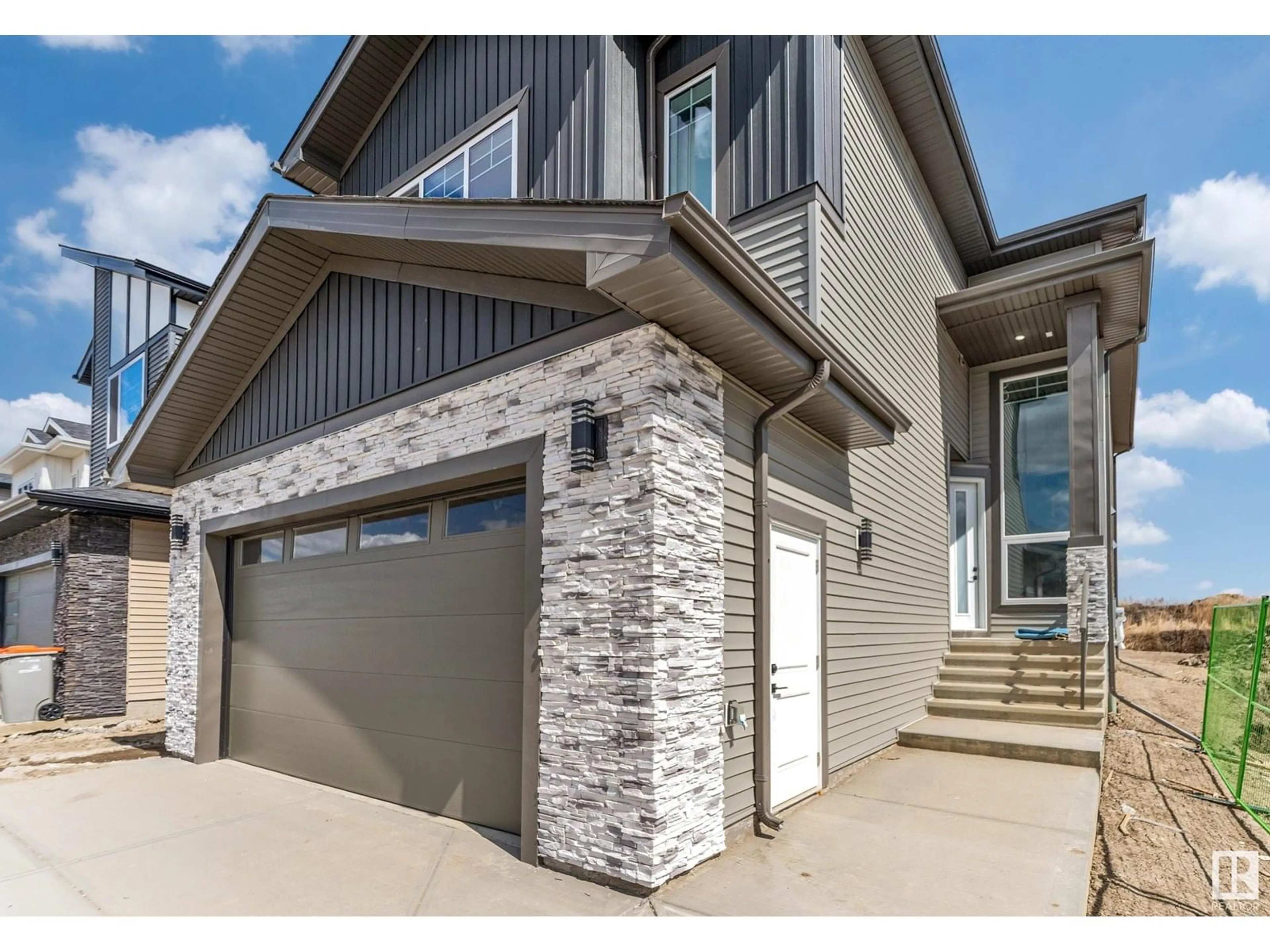 Home with vinyl exterior material, street for NE - 6245 19 ST, Rural Leduc County Alberta T4X3C8