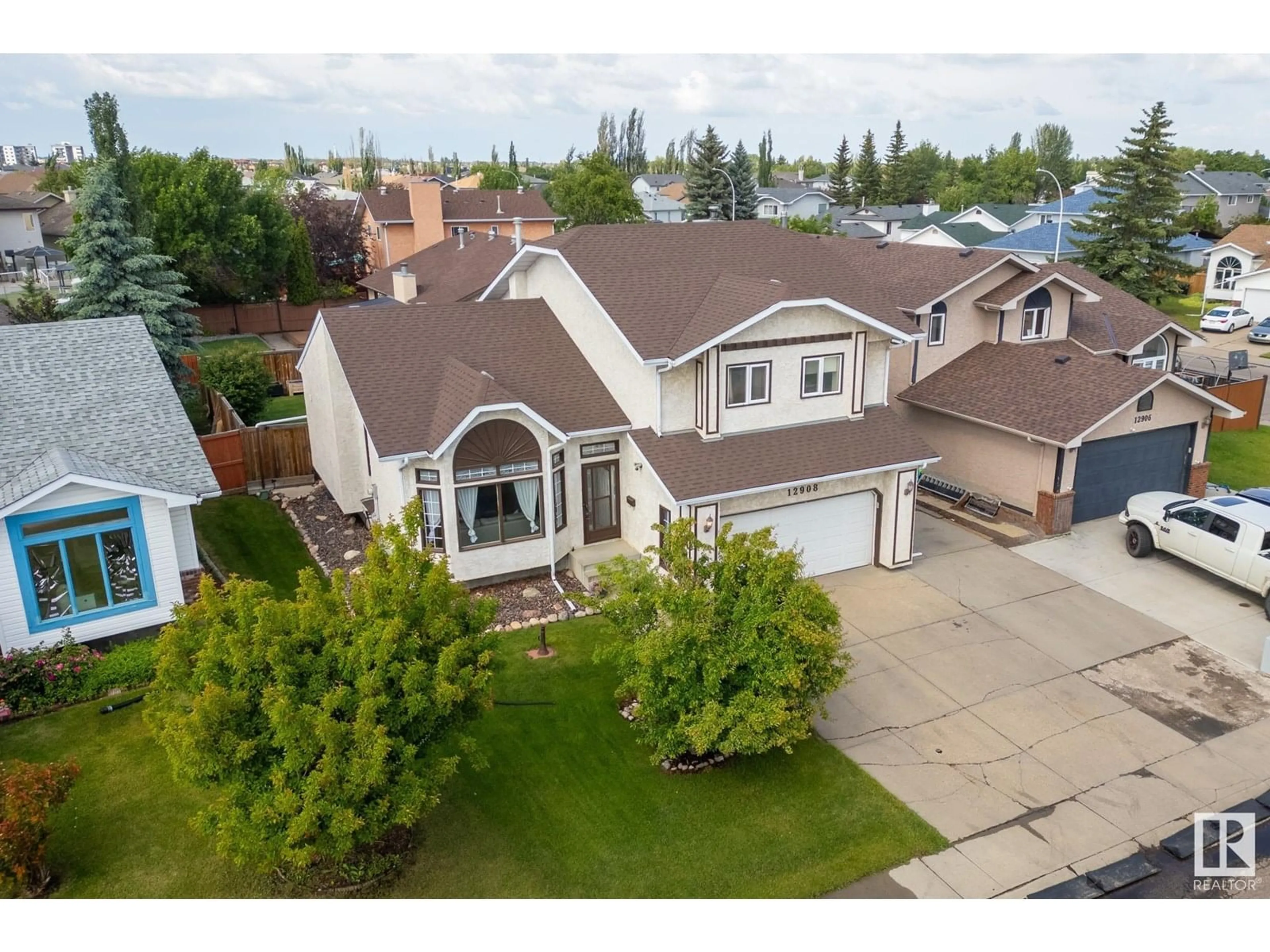 A pic from outside/outdoor area/front of a property/back of a property/a pic from drone, street for 12908 159 AV, Edmonton Alberta T6V1B3