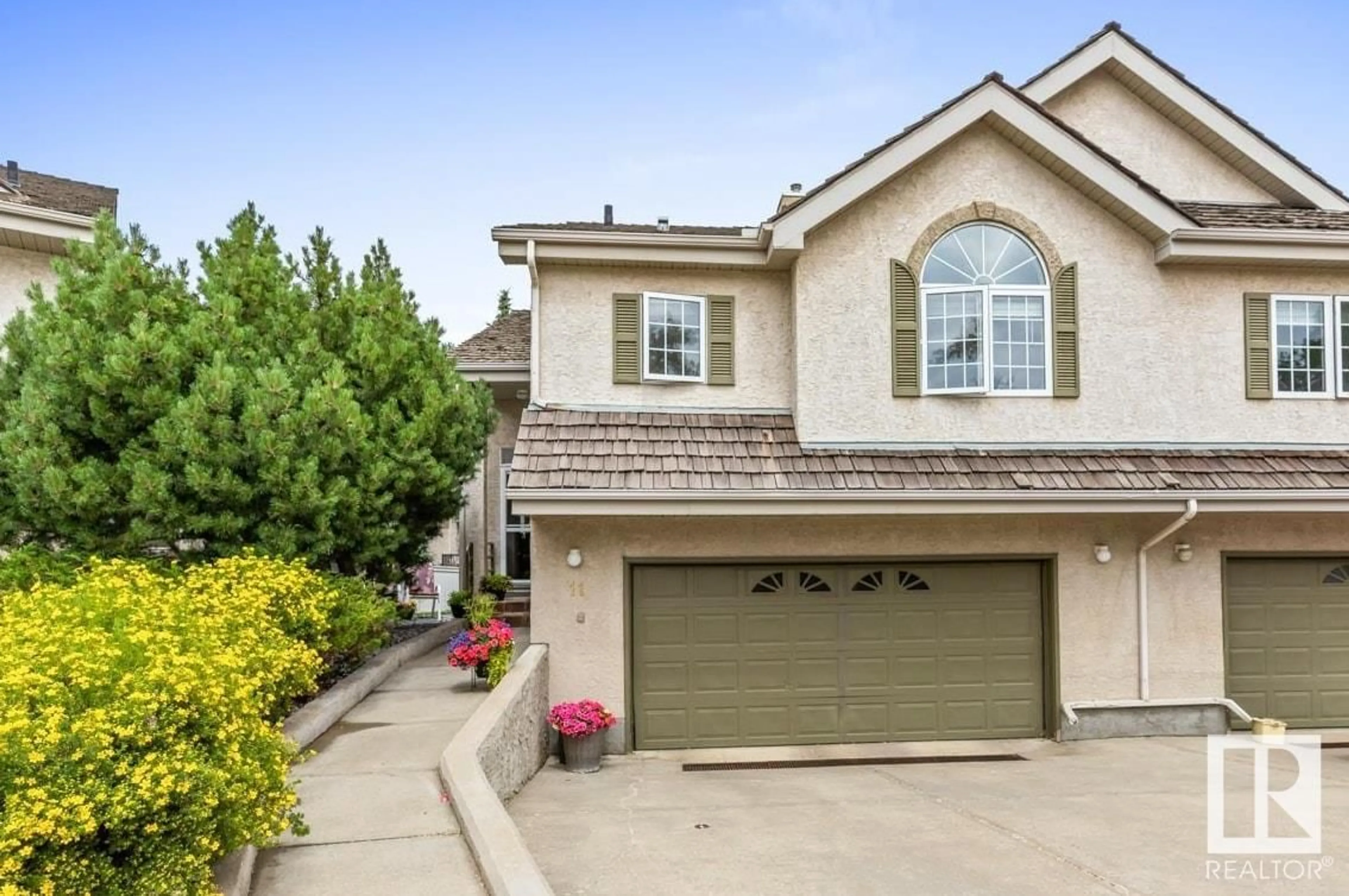Home with vinyl exterior material, street for #11 - 1283 CARTER CREST RD, Edmonton Alberta T6R2N5