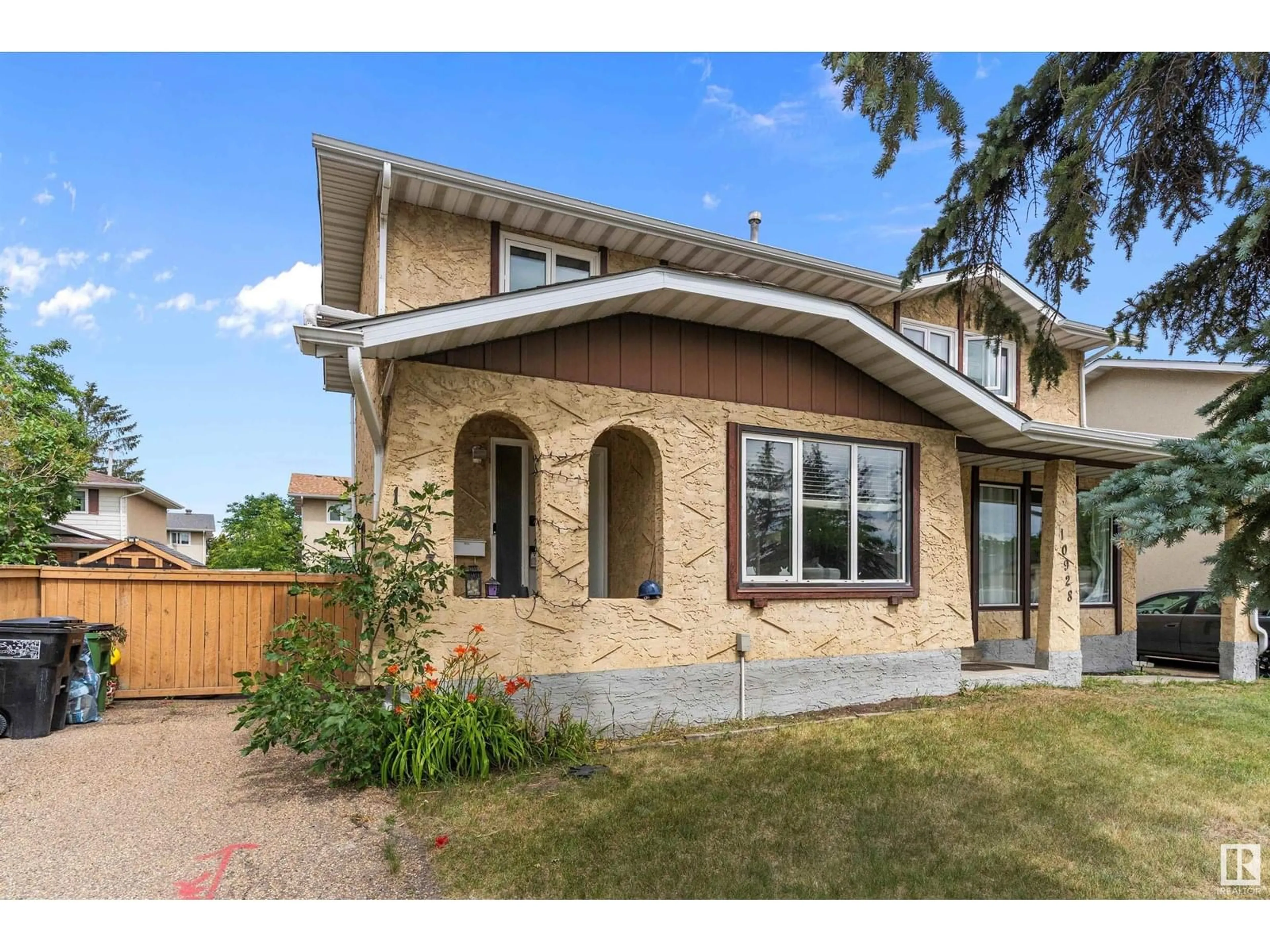 Home with brick exterior material, street for 10930 BEAUMARIS RD, Edmonton Alberta T5X1Z6