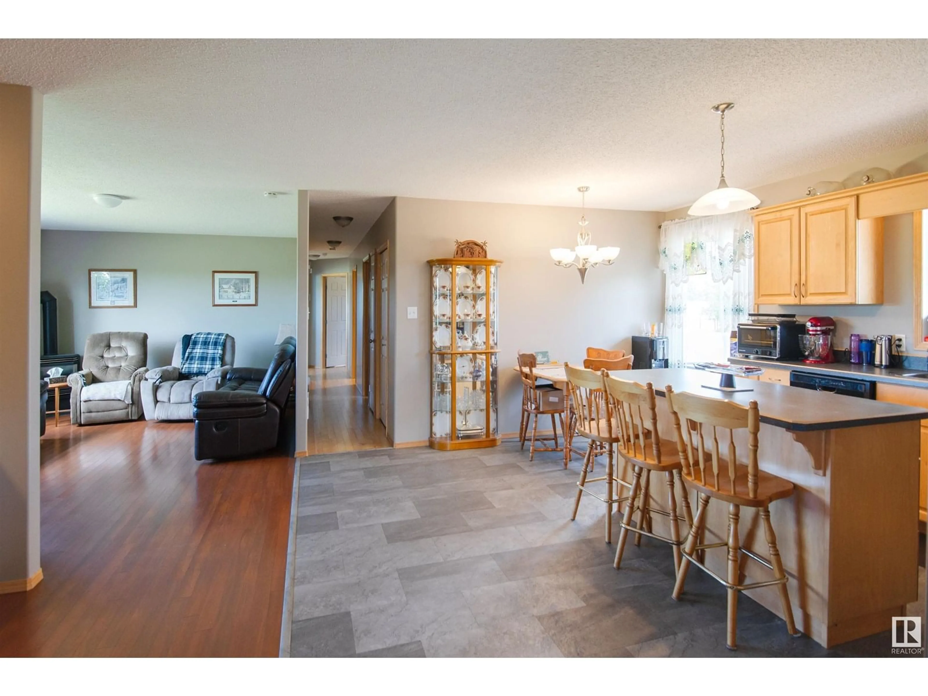 Open concept kitchen, wood/laminate floor for 62219 RGE RD 483, Rural Bonnyville M.D. Alberta T0A1P0